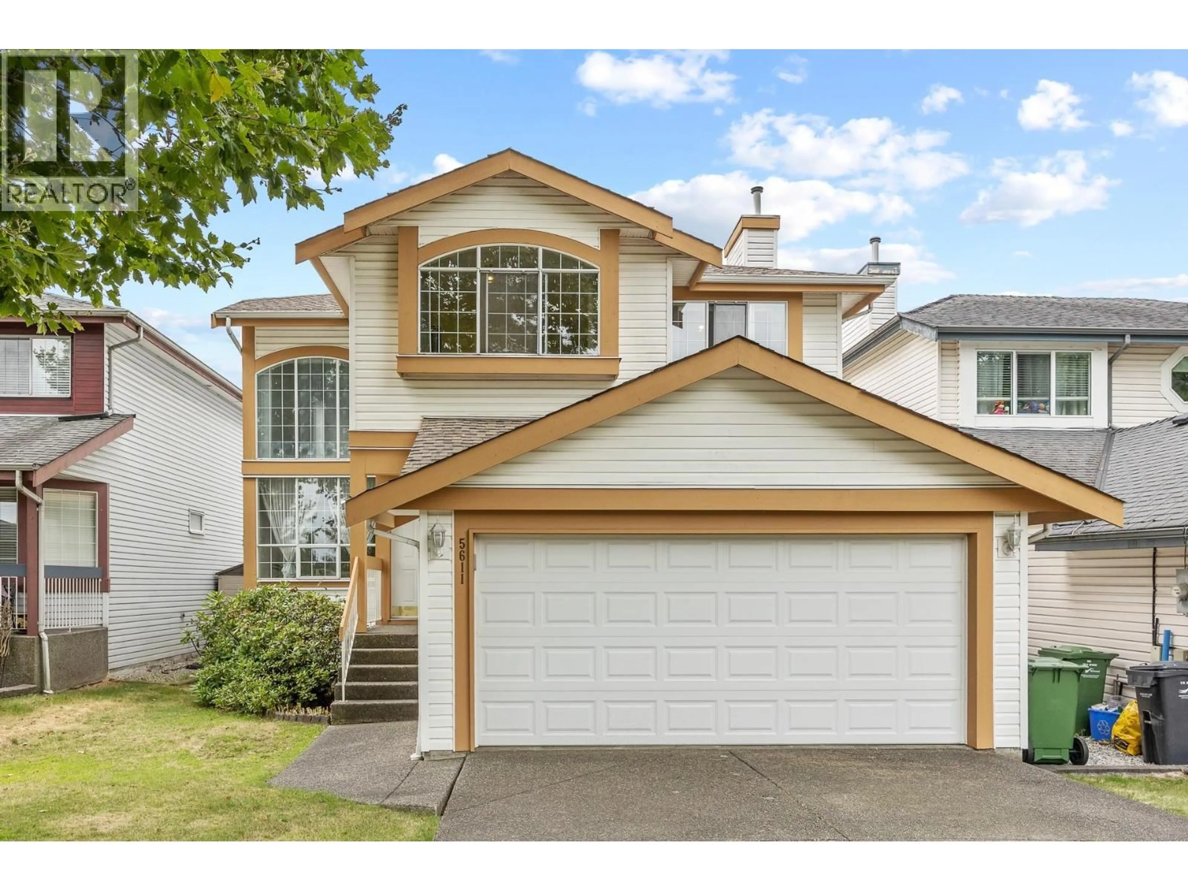 Home with vinyl exterior material, street for 5611 MCRAE STREET, Richmond British Columbia V6V2P5