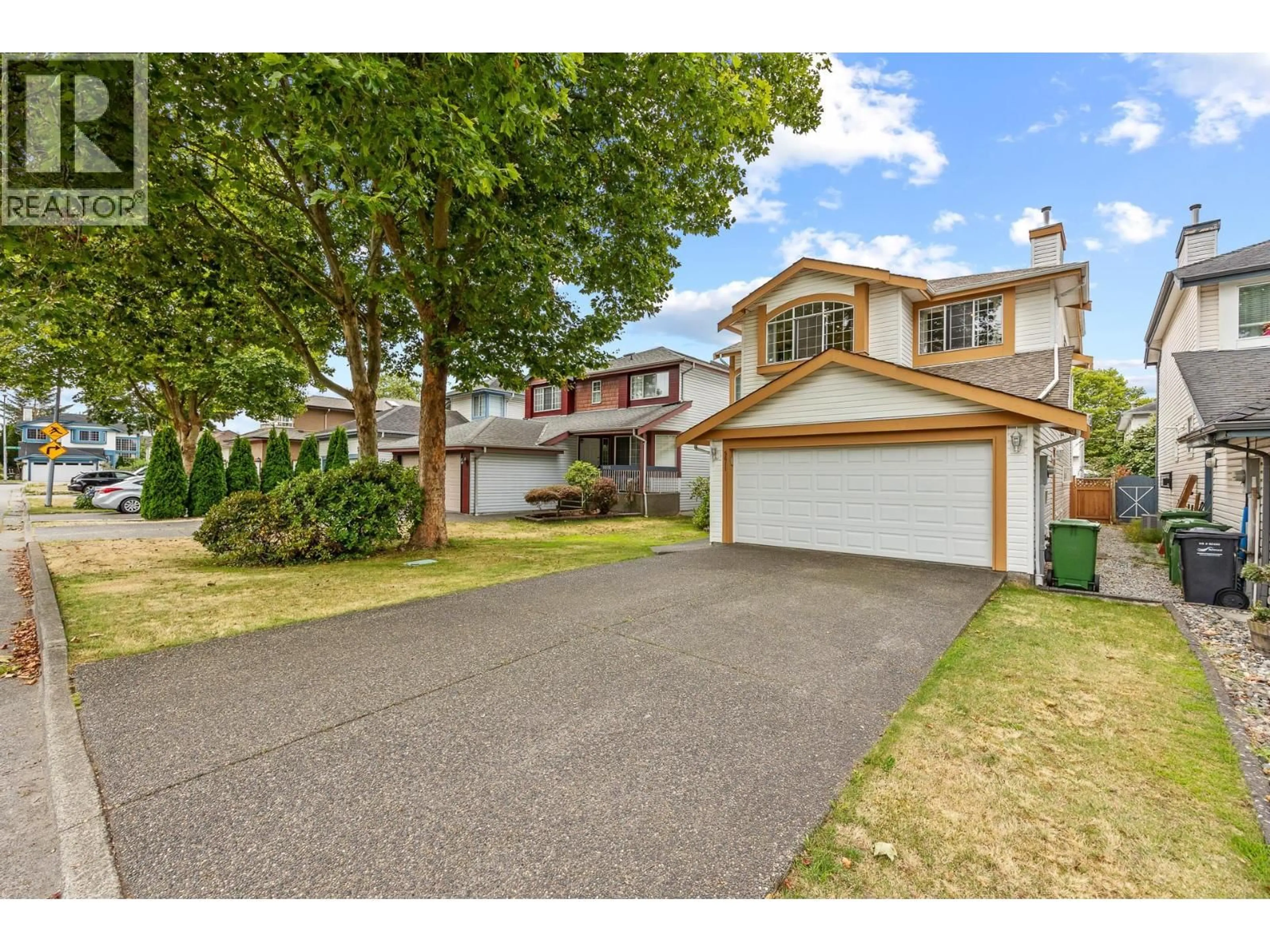 Home with vinyl exterior material, street for 5611 MCRAE STREET, Richmond British Columbia V6V2P5