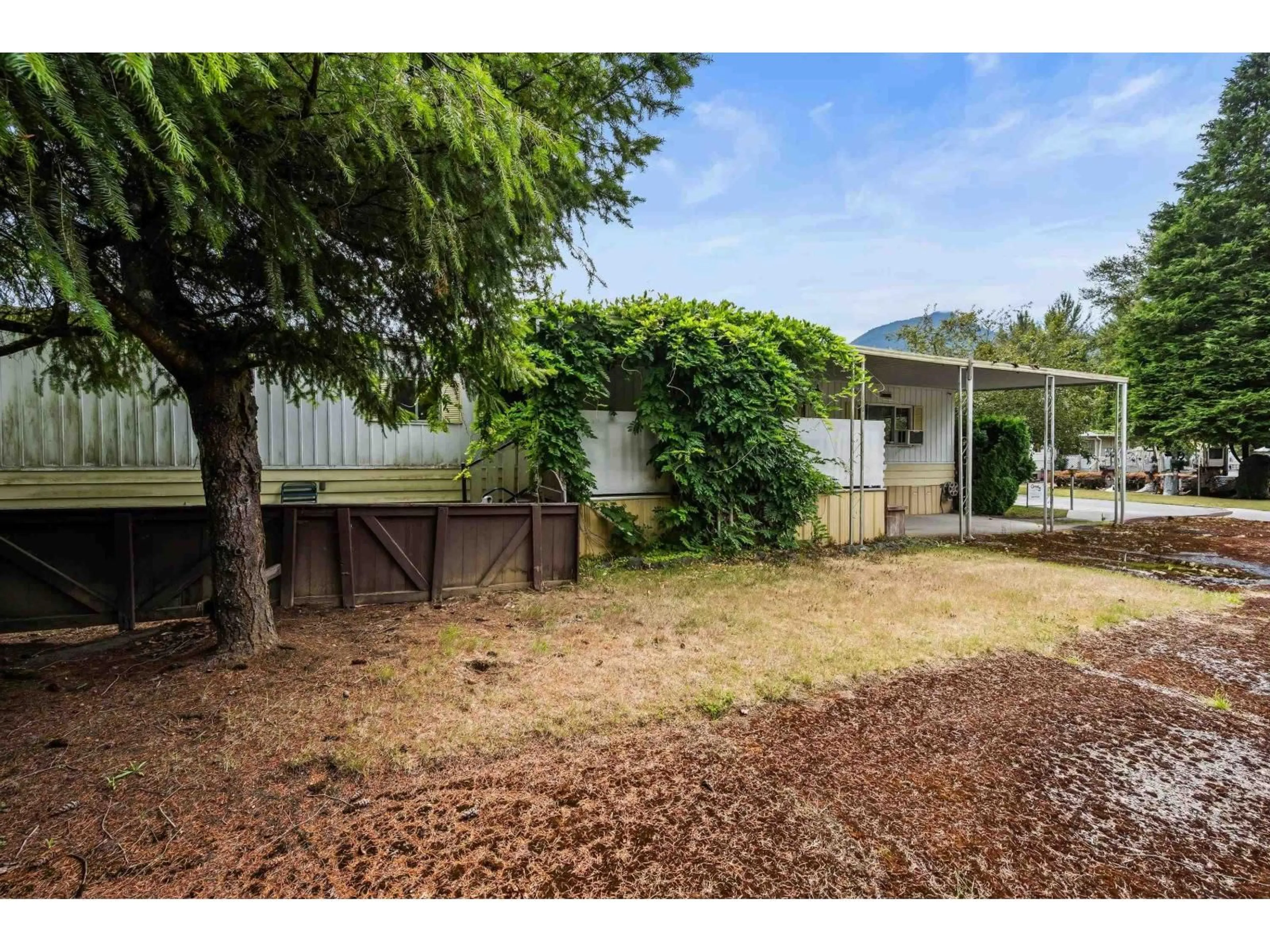 A pic from outside/outdoor area/front of a property/back of a property/a pic from drone, unknown for 2 - 46484 CHILLIWACK LAKE ROAD, Chilliwack British Columbia V2R3R7