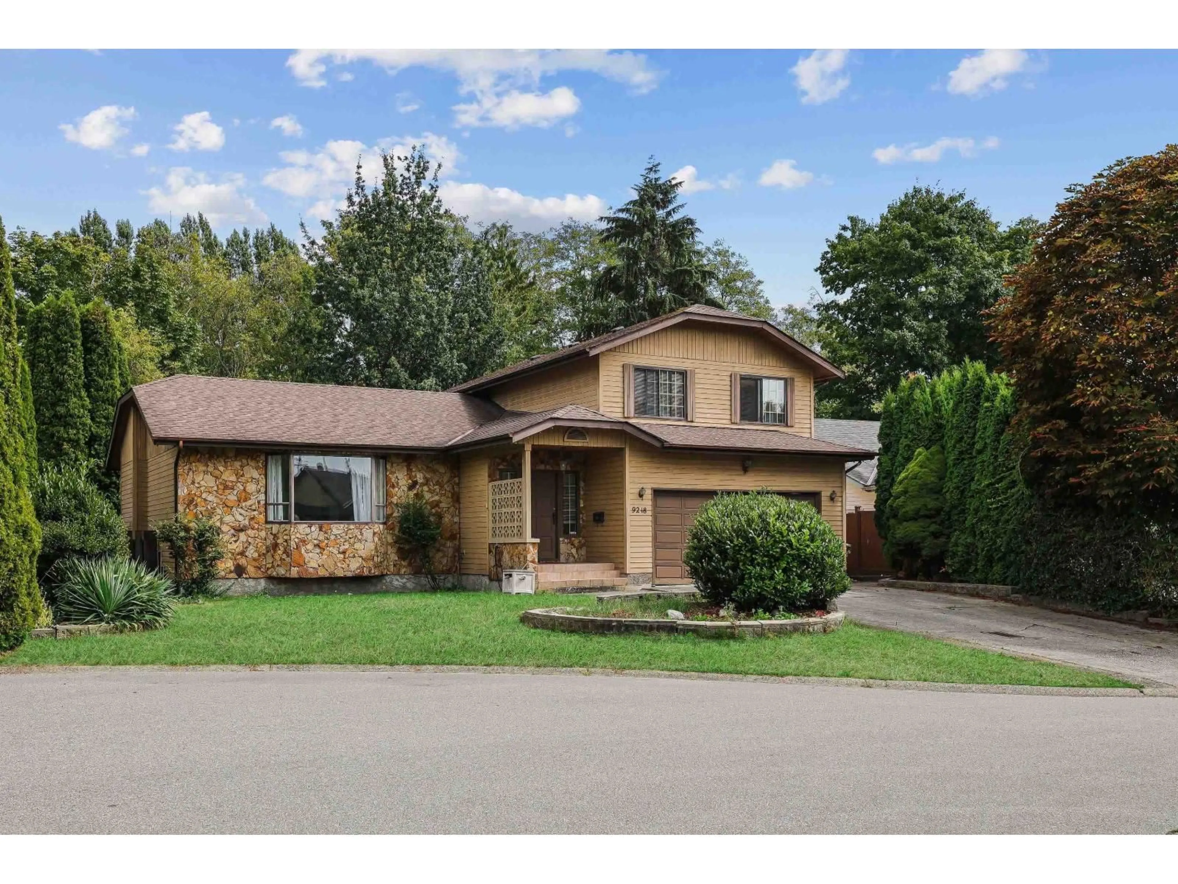 Home with brick exterior material, street for 9218 136B, Surrey British Columbia V3W1K5
