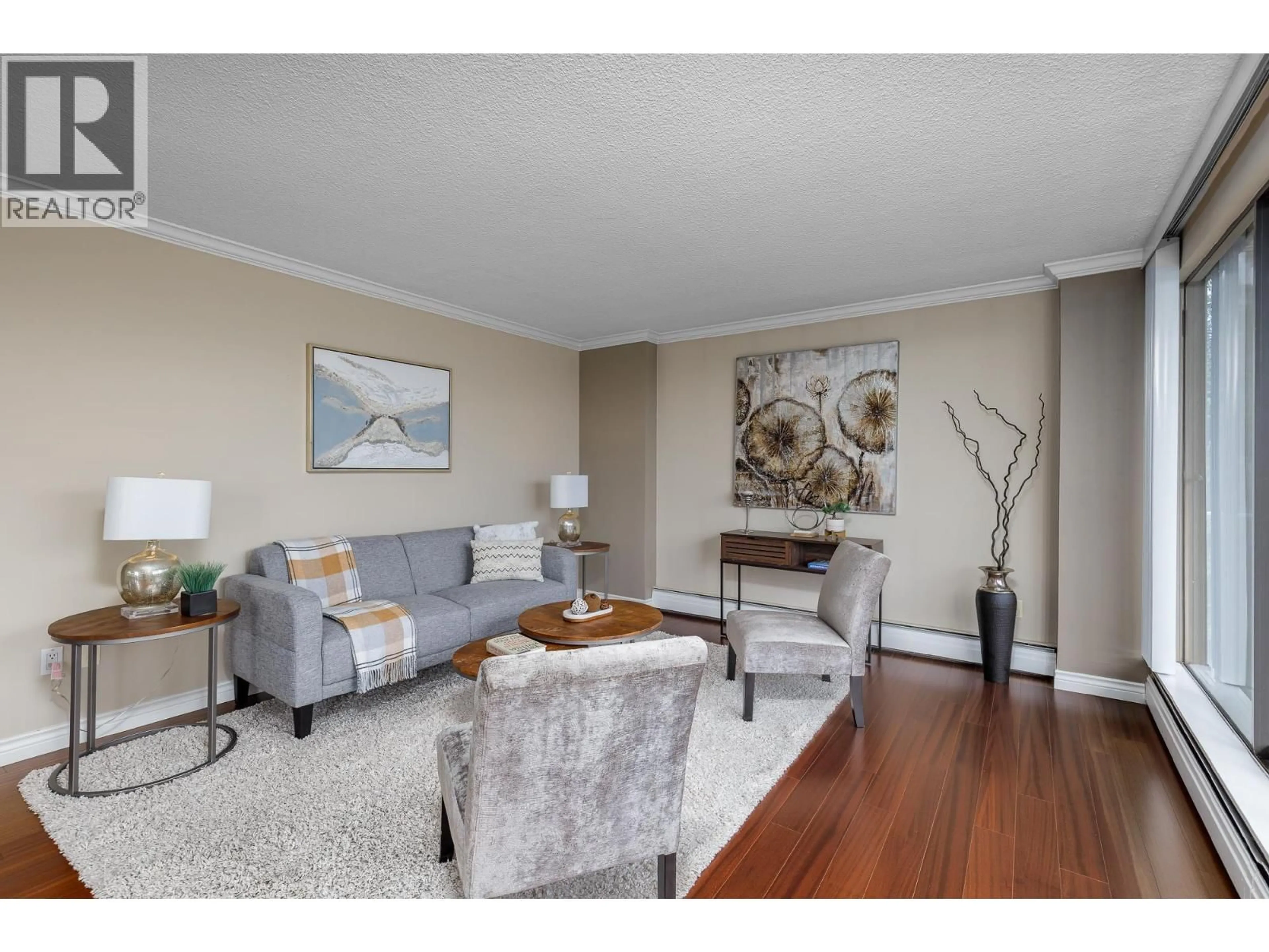 Living room with furniture, wood/laminate floor for 803 - 1745 ESQUIMALT AVENUE, West Vancouver British Columbia V7V1R7