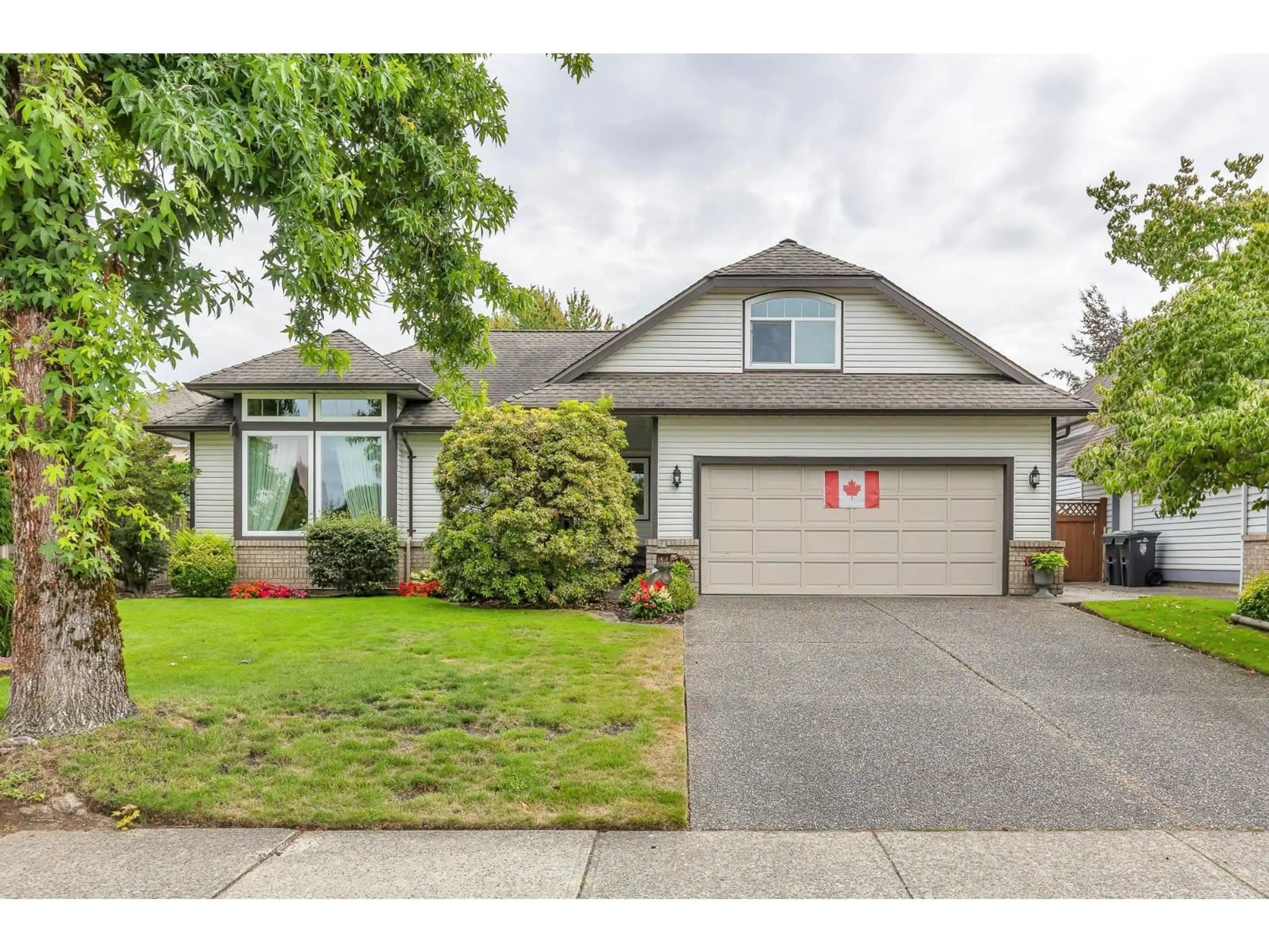 Home with vinyl exterior material, street for 4582 217B, Langley British Columbia V3A9E1