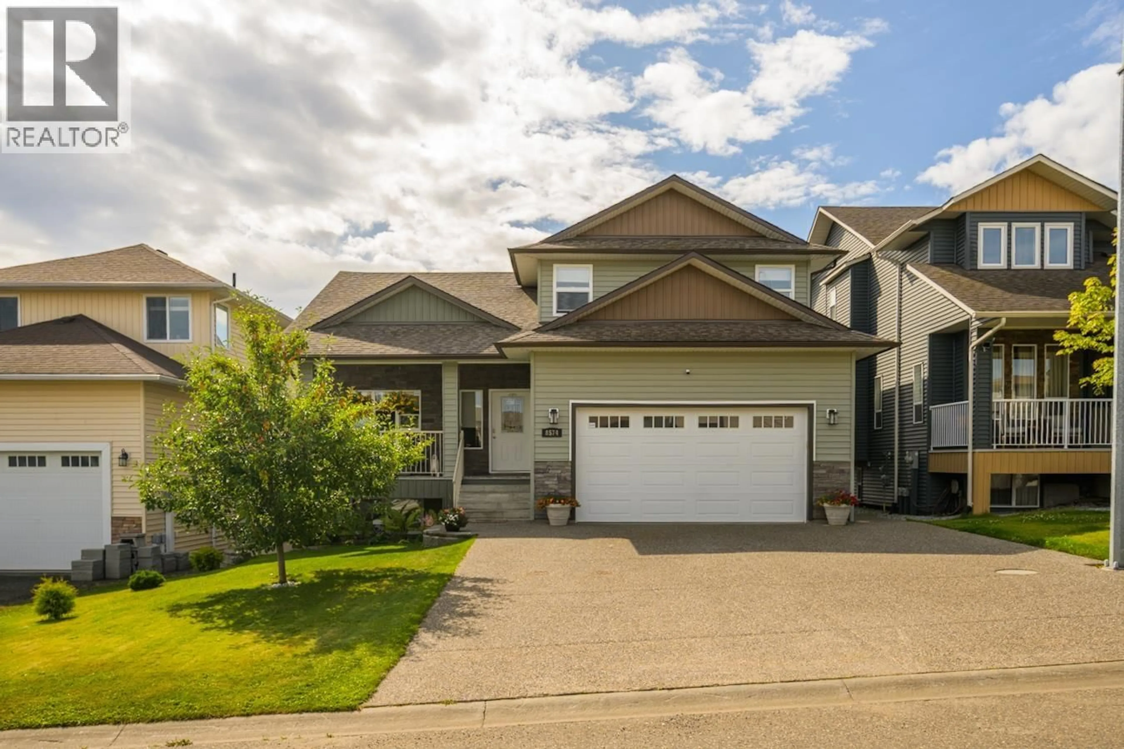 Home with vinyl exterior material, street for 8574 ST LAWRENCE AVENUE, Prince George British Columbia V2N0B6