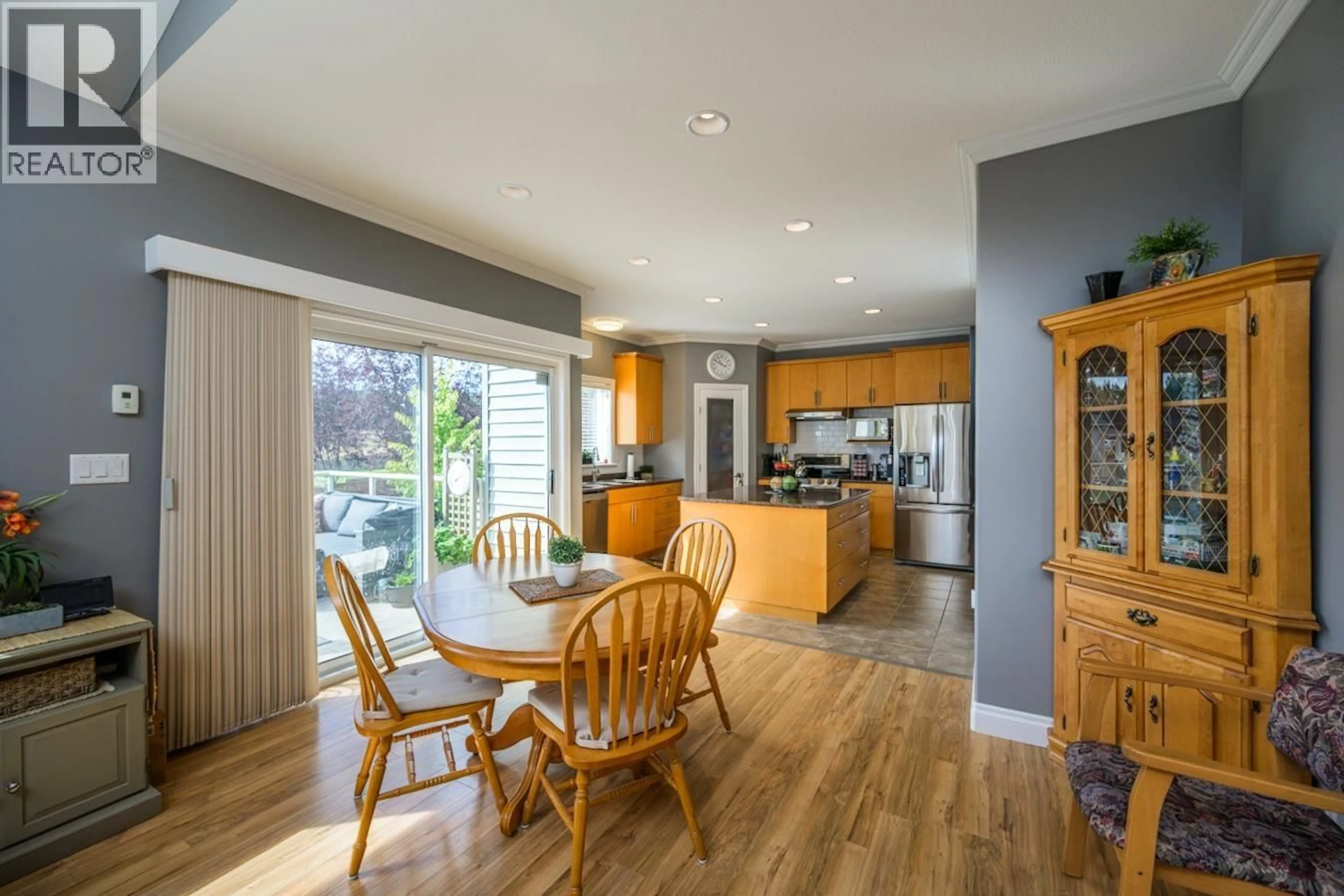 Open concept kitchen, wood/laminate floor for 8574 ST LAWRENCE AVENUE, Prince George British Columbia V2N0B6