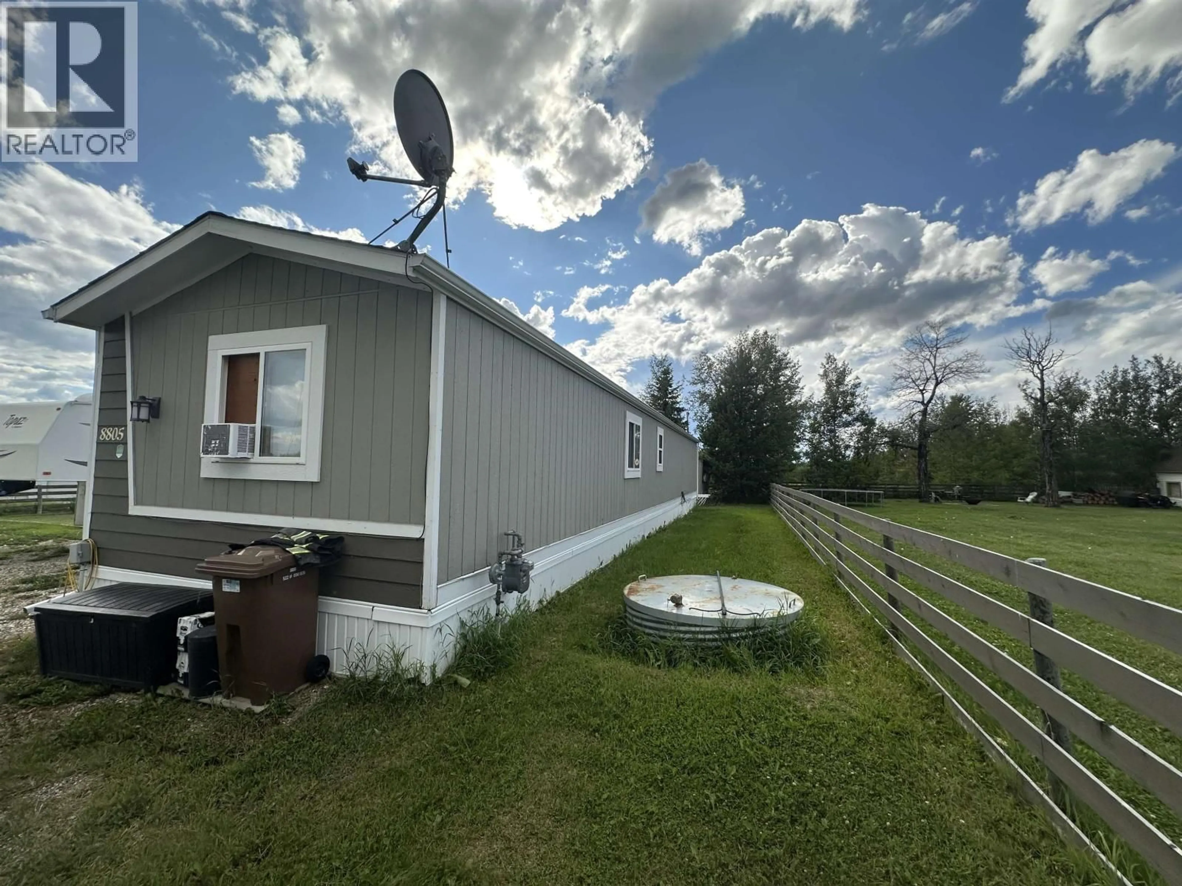 A pic from outside/outdoor area/front of a property/back of a property/a pic from drone, unknown for 8805 PINE ROAD, Fort St. John British Columbia V1J4M7