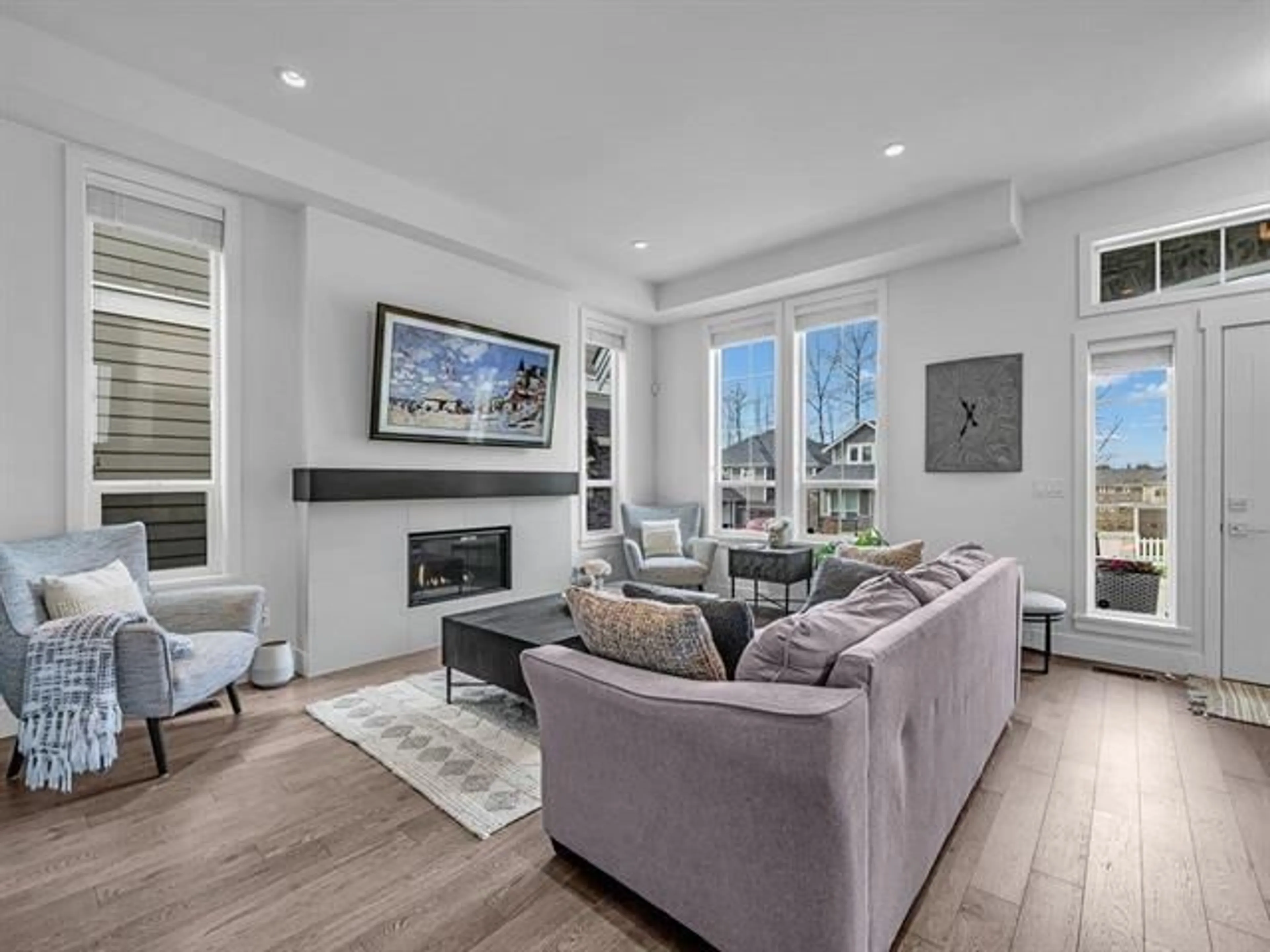 Living room with furniture, wood/laminate floor for 2136 164A, Surrey British Columbia V3Z0V5