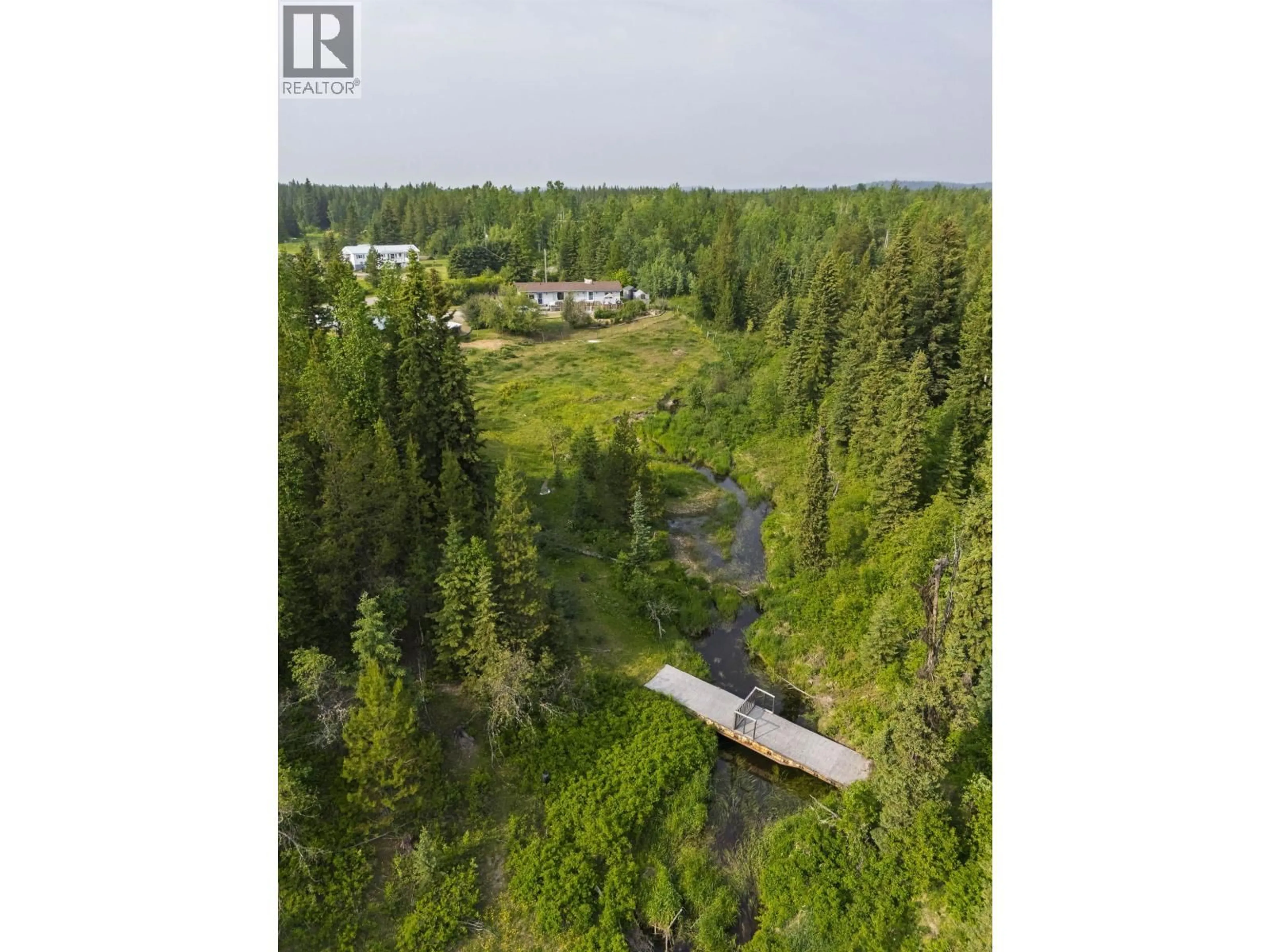 A pic from outside/outdoor area/front of a property/back of a property/a pic from drone, forest/trees view for 23700 RED ROCK ROAD, Prince George British Columbia V2N5Z1