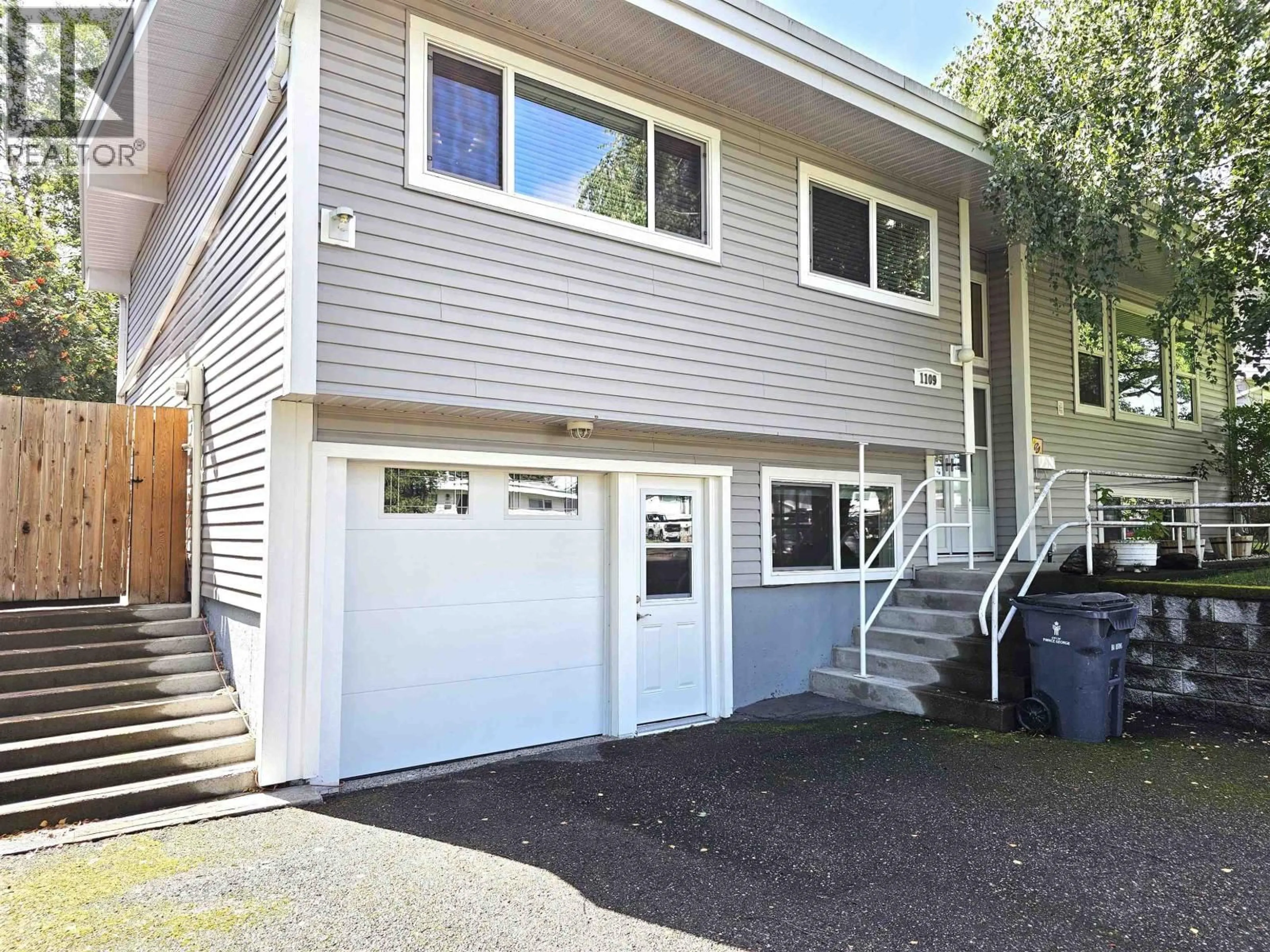 Home with vinyl exterior material, street for 1109 QUAW AVENUE, Prince George British Columbia V2M4C7