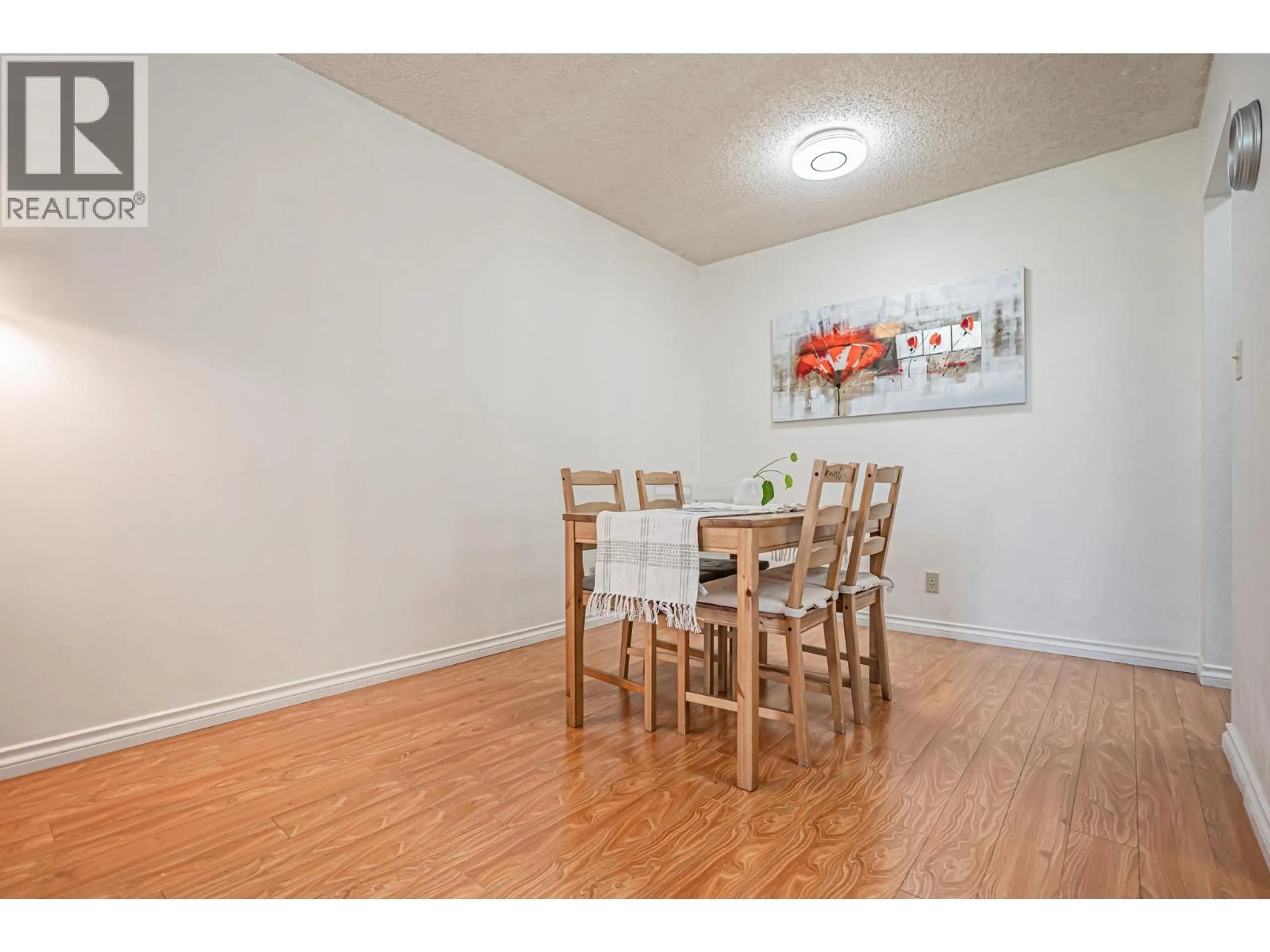 Dining room, wood/laminate floor for 203 - 5471 ARCADIA ROAD, Richmond British Columbia V6X2H1