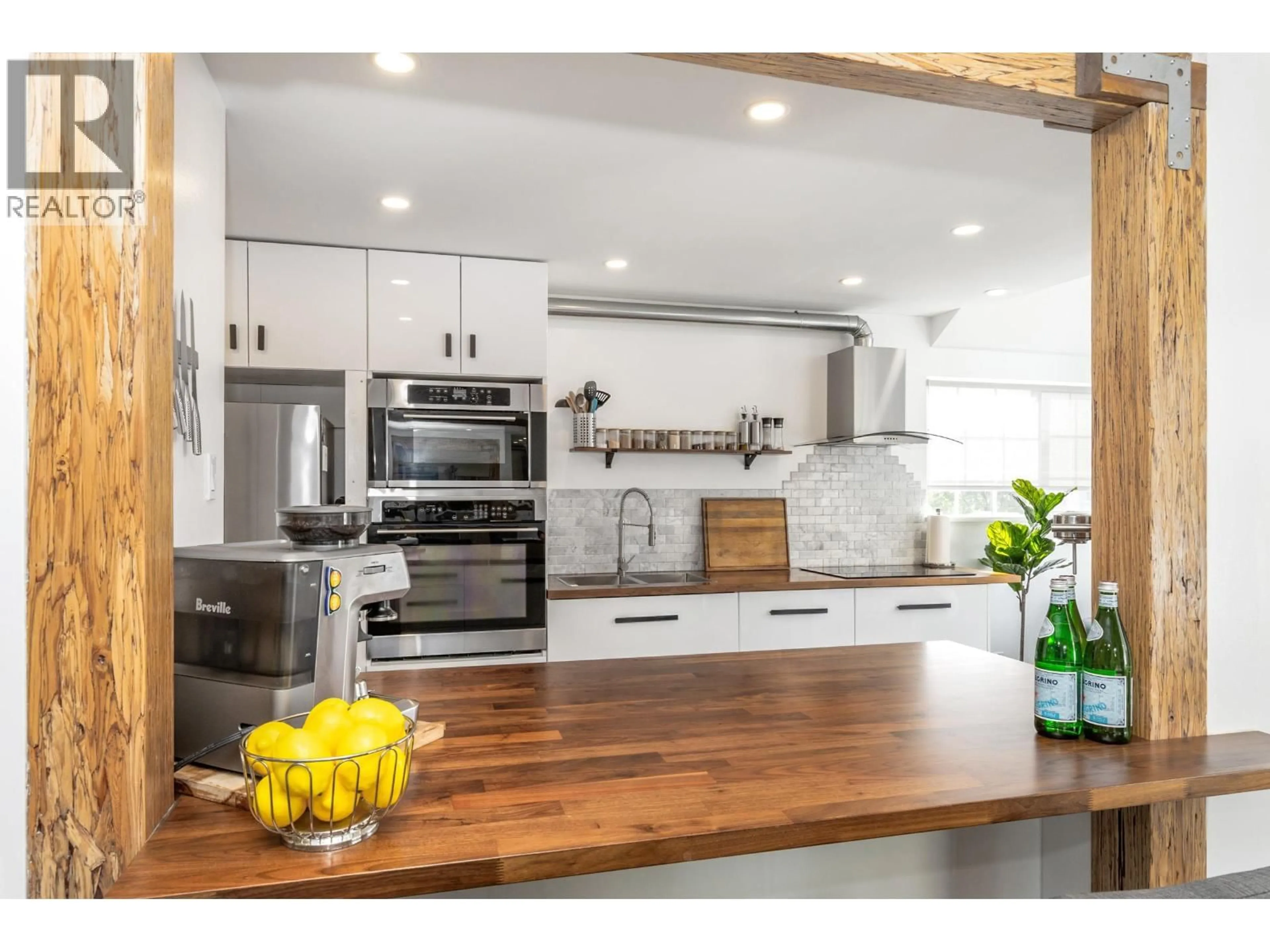 Open concept kitchen, wood/laminate floor for 2313 QUAYSIDE COURT, Vancouver British Columbia V5P4W2