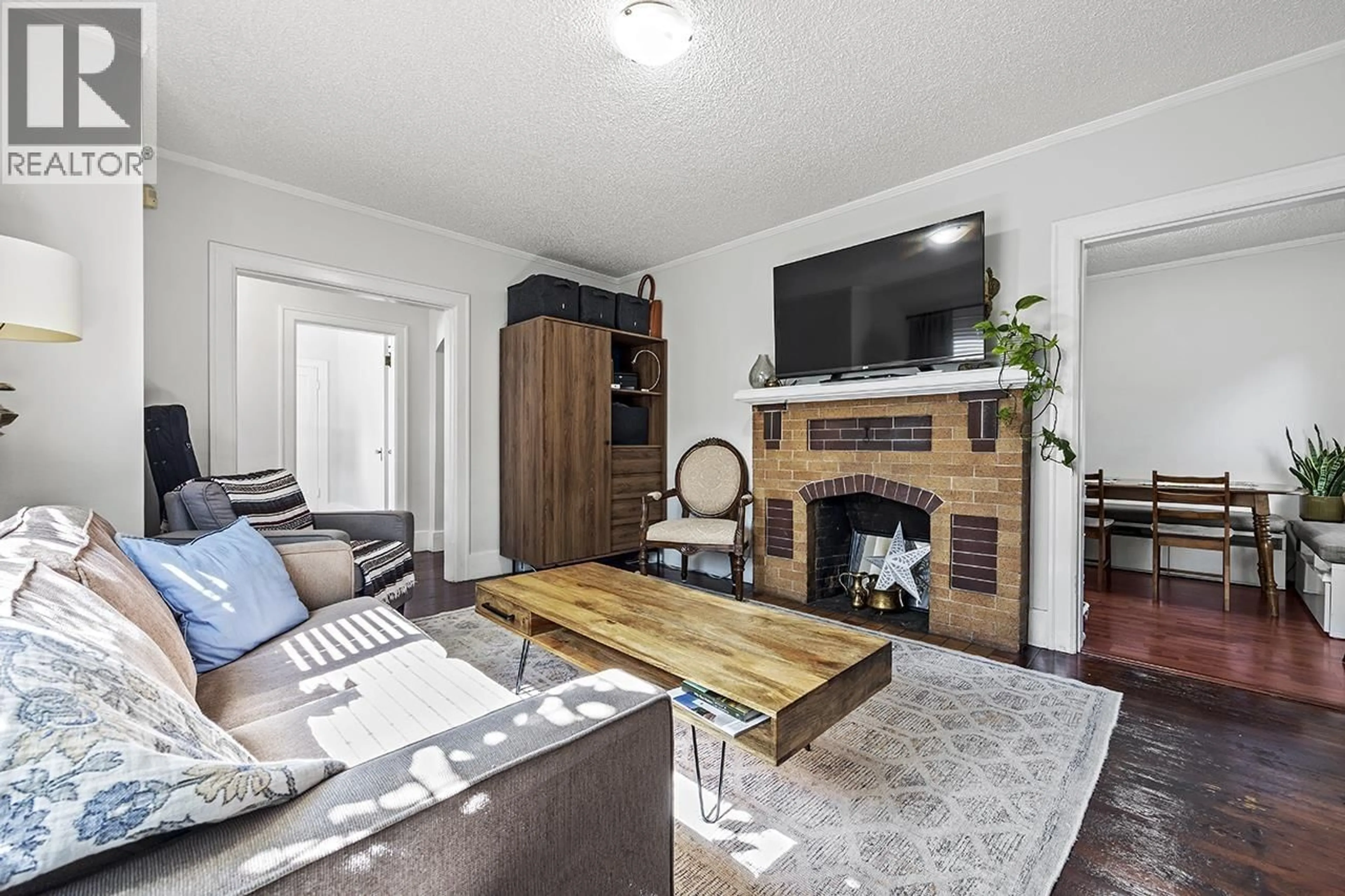 Living room with furniture, wood/laminate floor for 815 EIGHTH AVENUE, New Westminster British Columbia V3M2R4