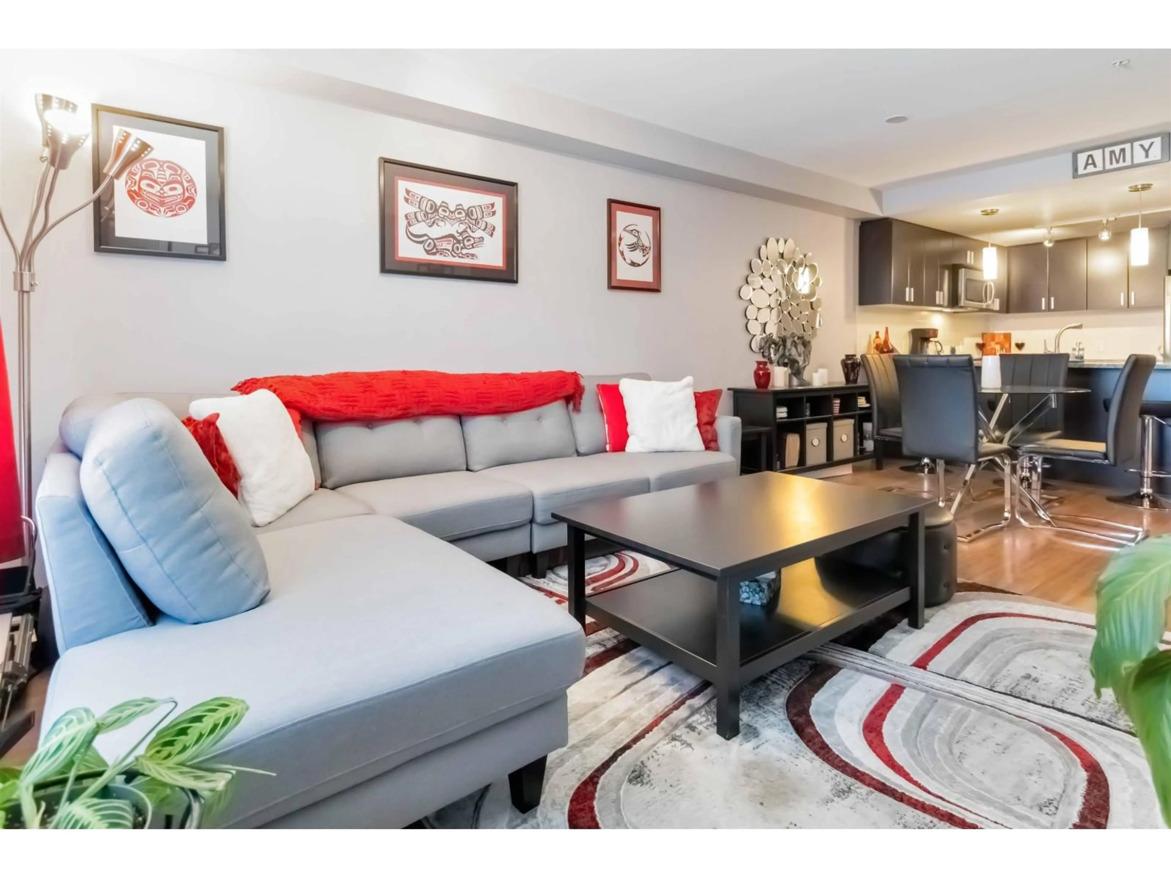 Living room with furniture, wood/laminate floor for 309 - 7511 120, Delta British Columbia V4C0C1