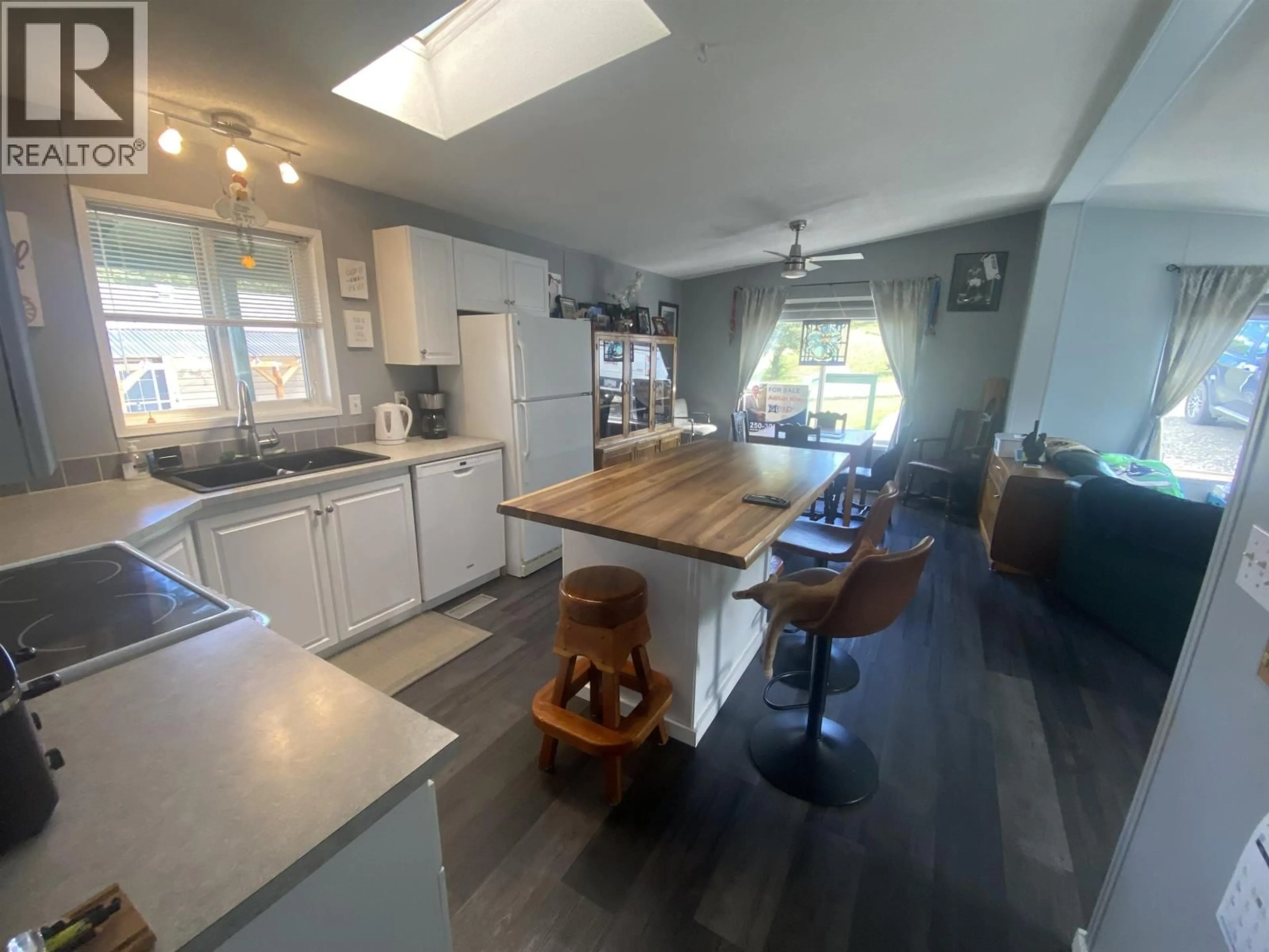Open concept kitchen, wood/laminate floor for 63 - 997 CHILCOTIN 20 HIGHWAY, Williams Lake British Columbia V2G4X6