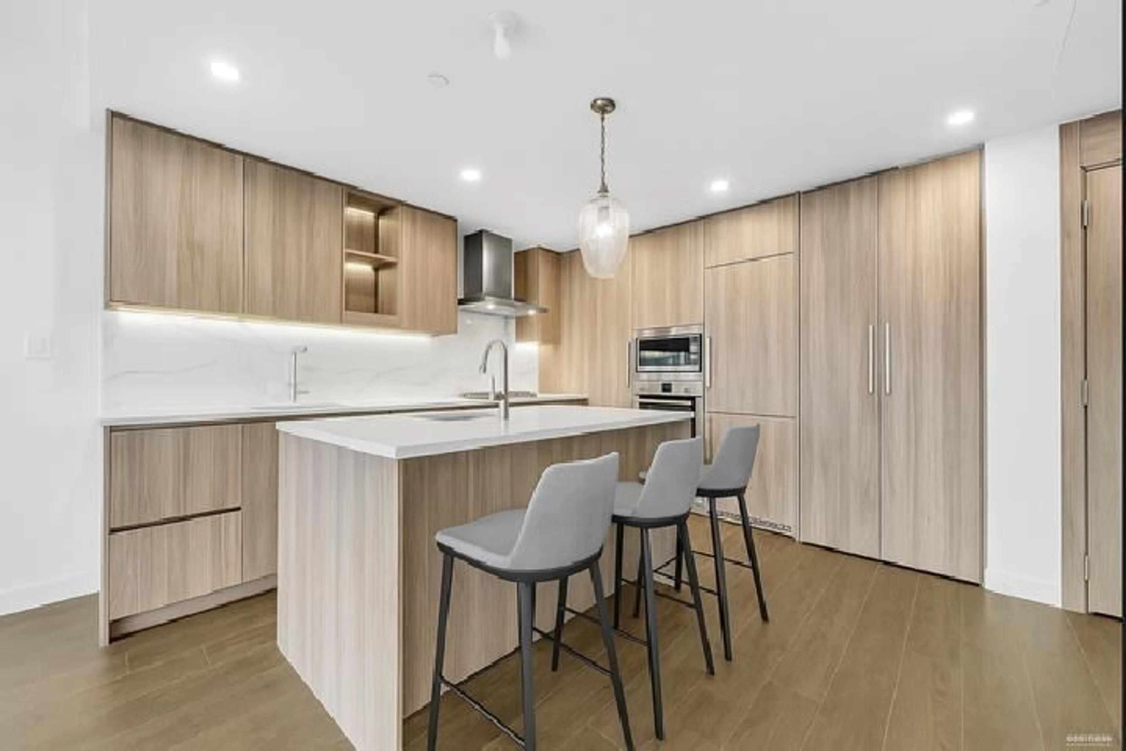 Open concept kitchen, wood/laminate floor for 3504 - 13768 100, Surrey British Columbia V3T5X7