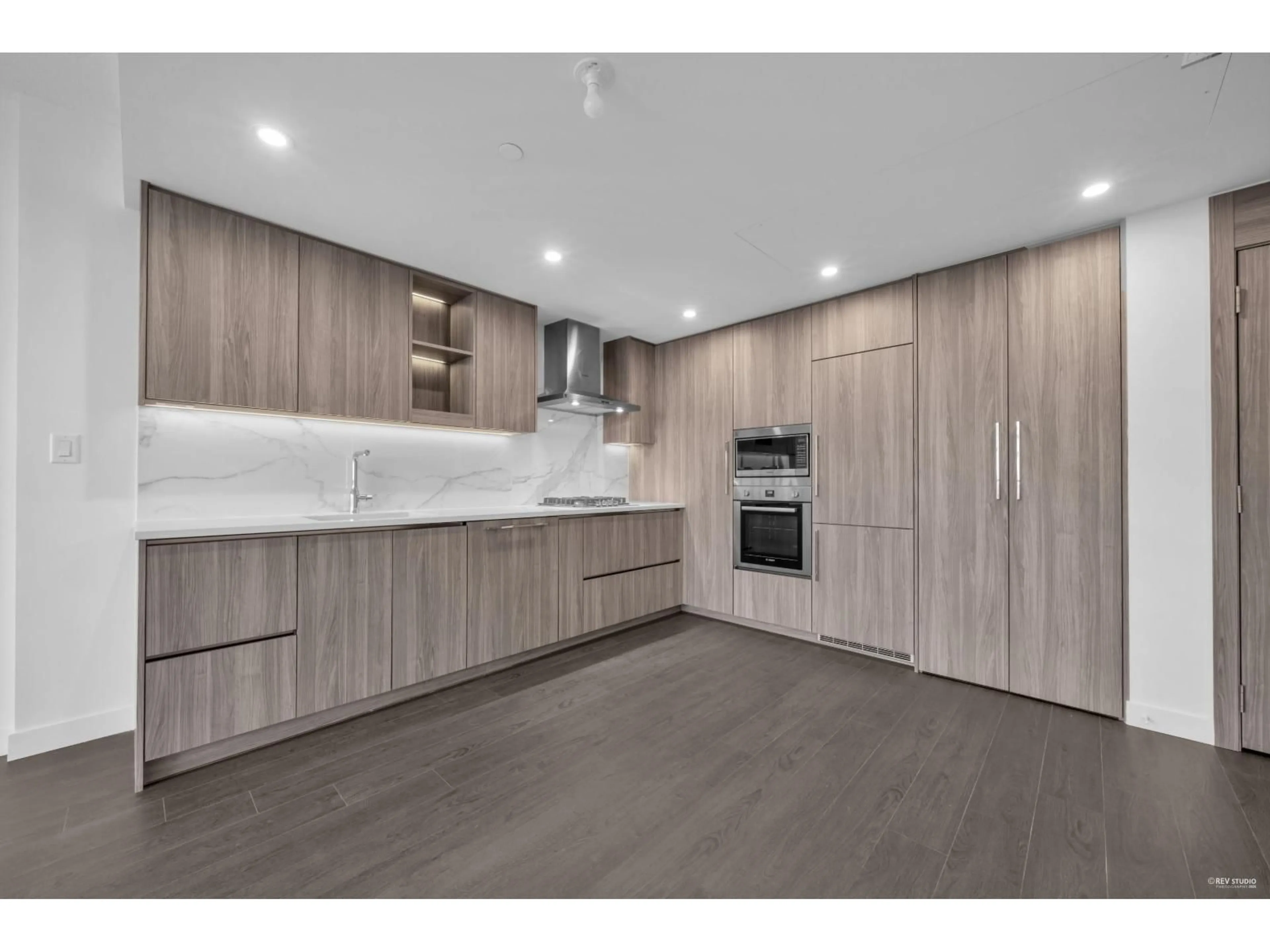 Open concept kitchen, wood/laminate floor for 3504 - 13768 100, Surrey British Columbia V3T5X7