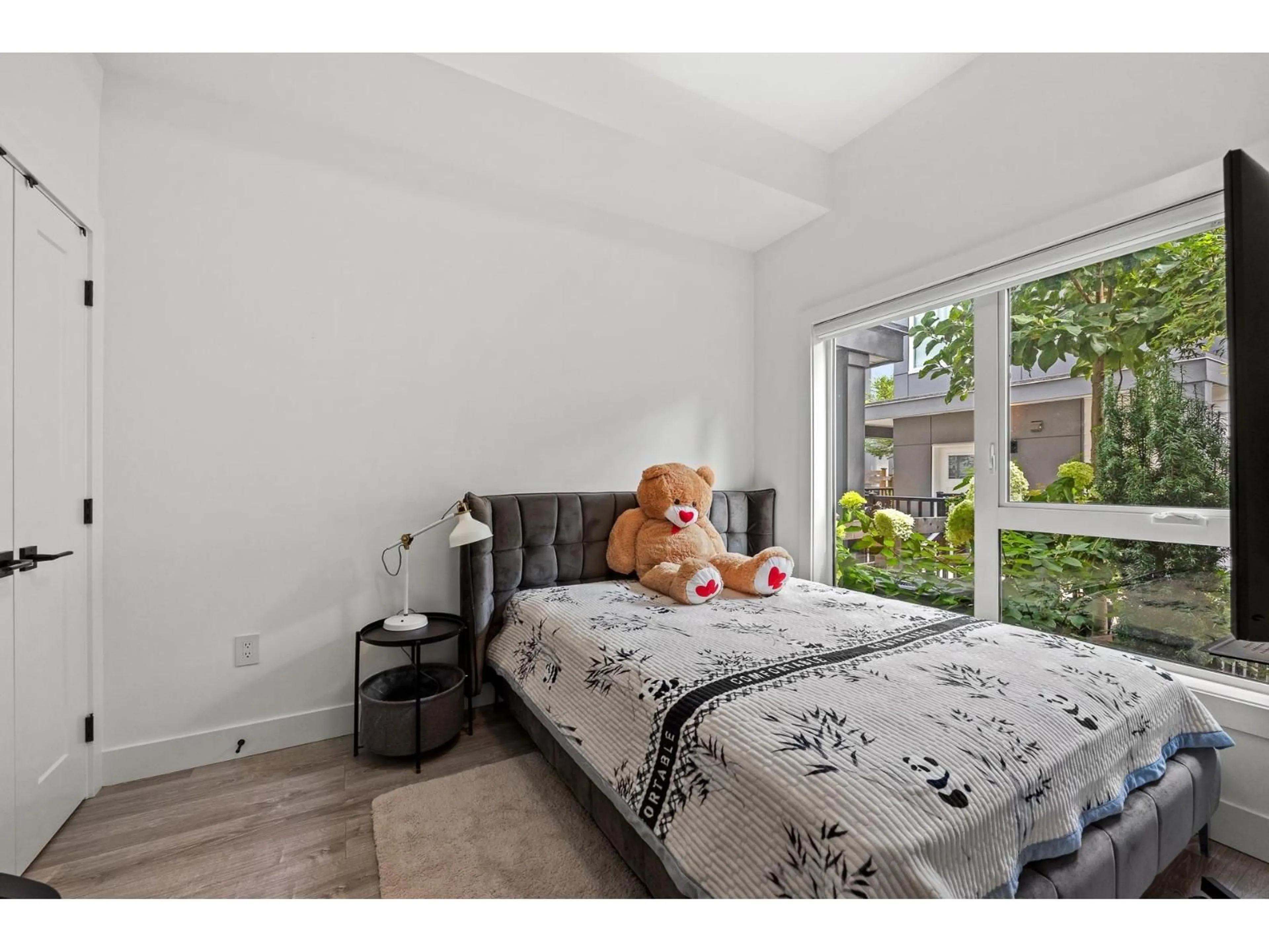 Bedroom with bed, wood/laminate floor for 21 - 15030 28, Surrey British Columbia V4P0H3