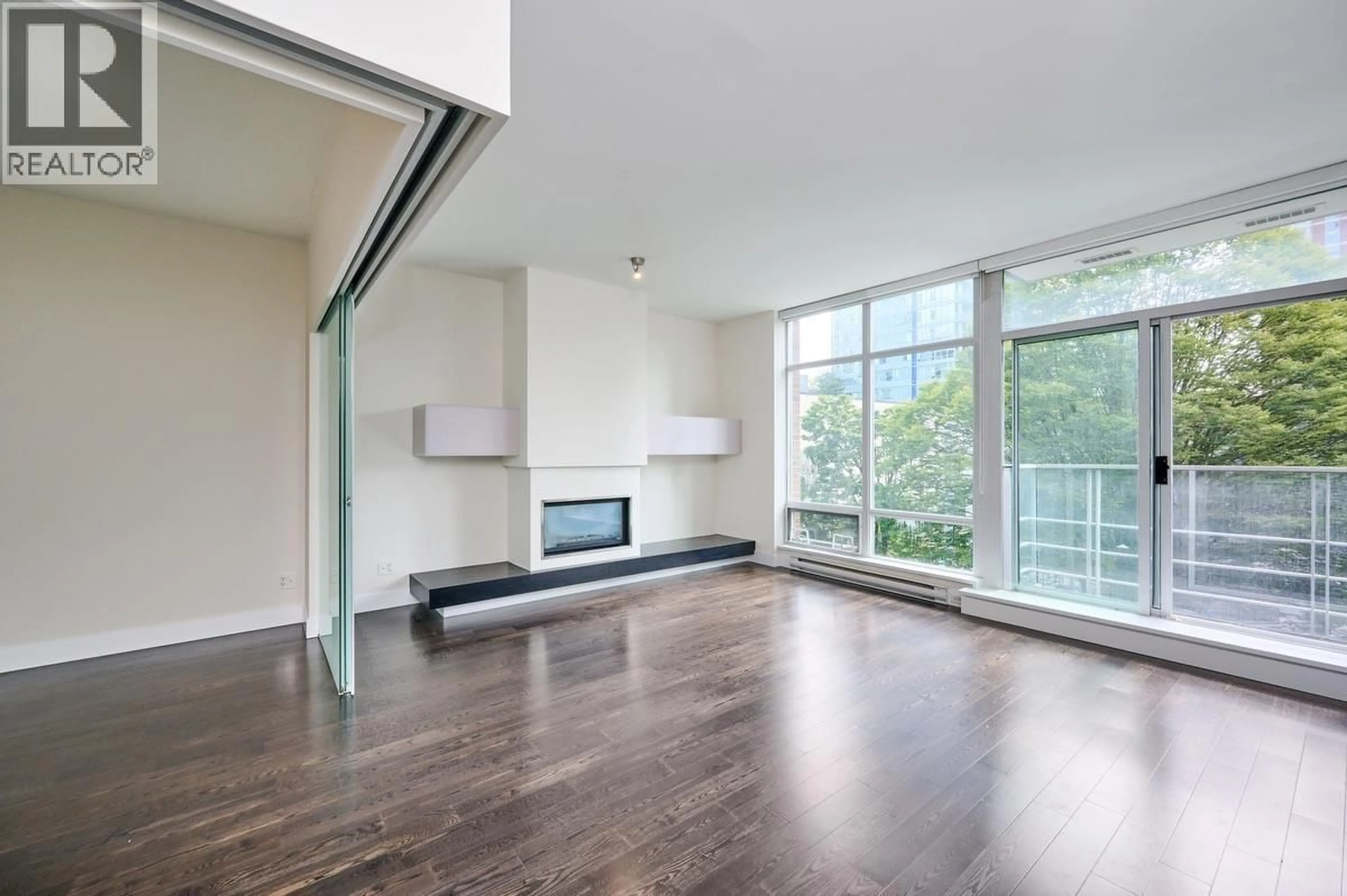 Living room with furniture, wood/laminate floor for 301 - 535 SMITHE STREET, Vancouver British Columbia V6B0H2