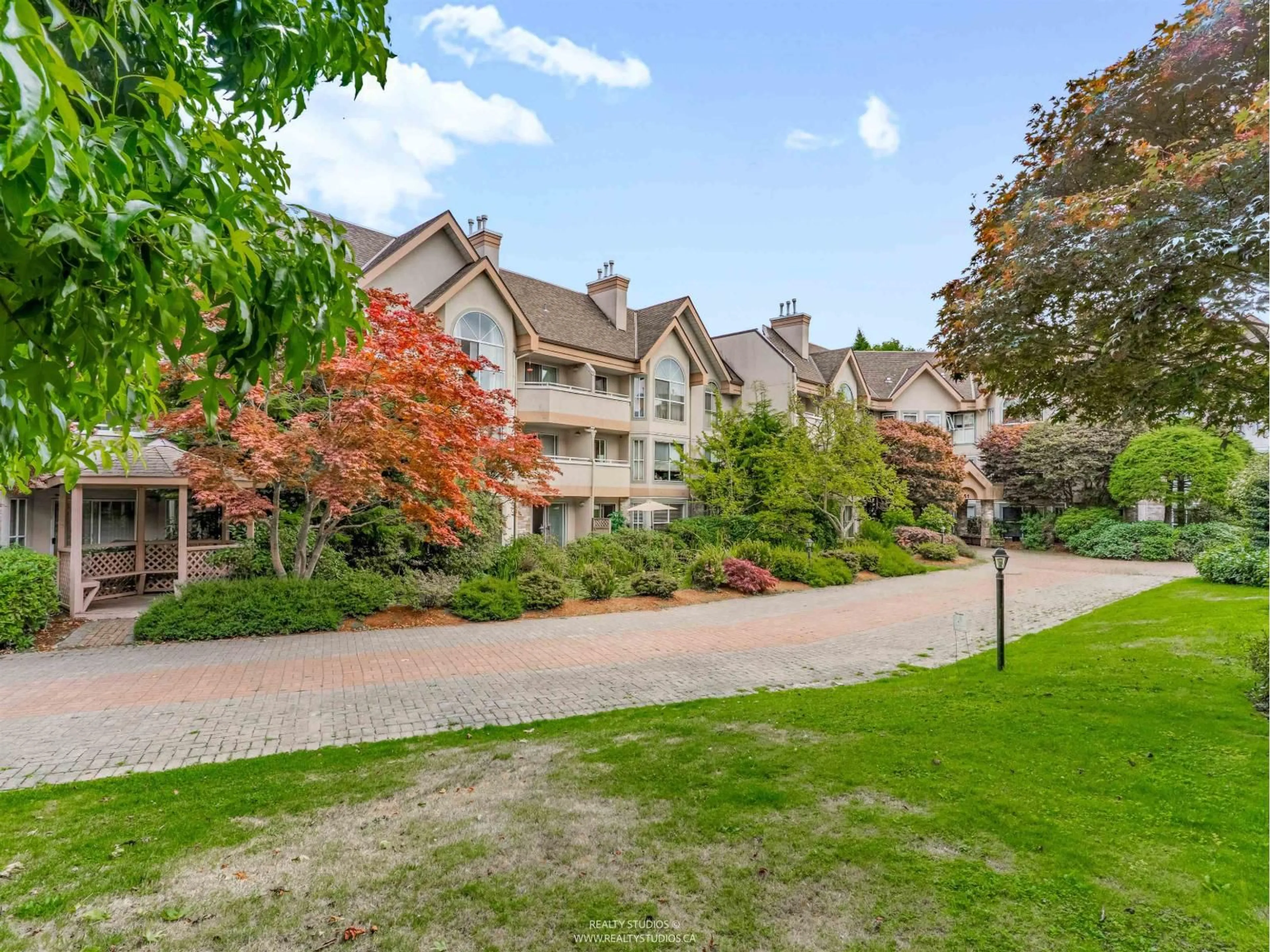 A pic from outside/outdoor area/front of a property/back of a property/a pic from drone, mountain view for 102 - 7151 121, Surrey British Columbia V3W0E7
