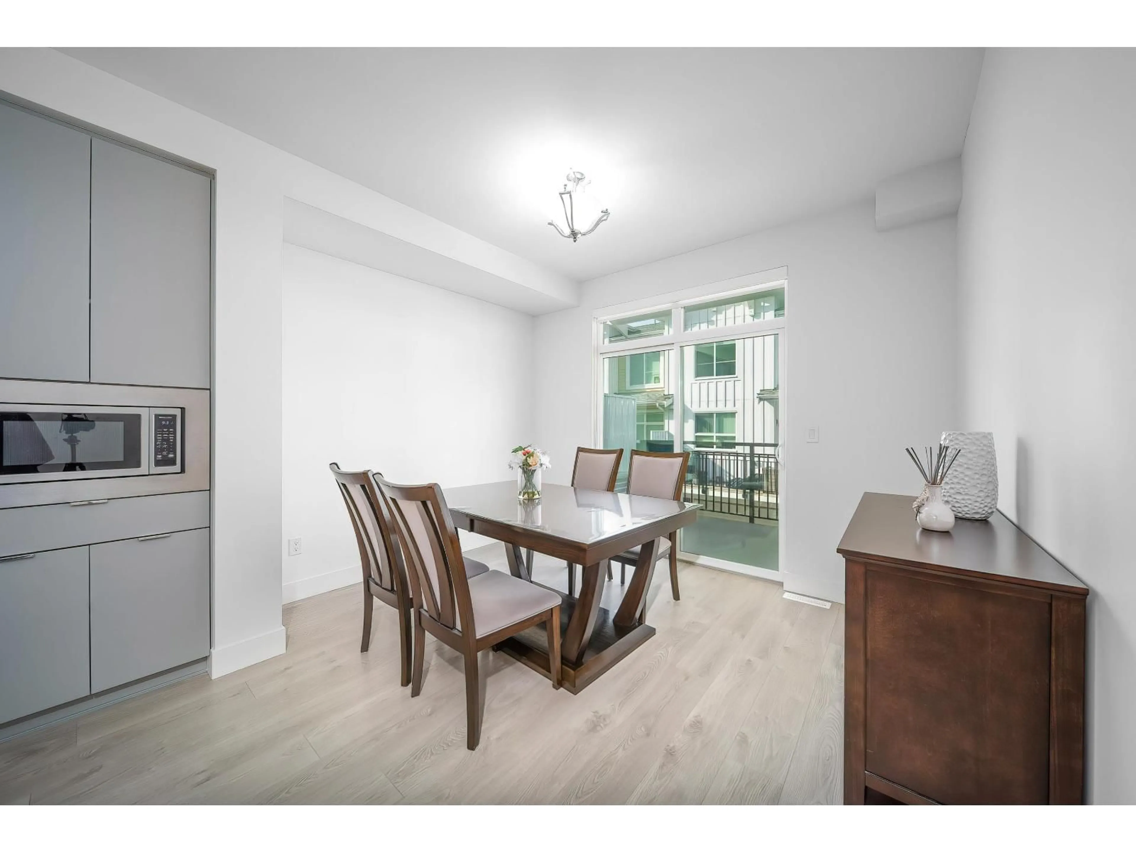 Dining room, wood/laminate floor for 50 - 16561 17A, Surrey British Columbia V3Z1J3
