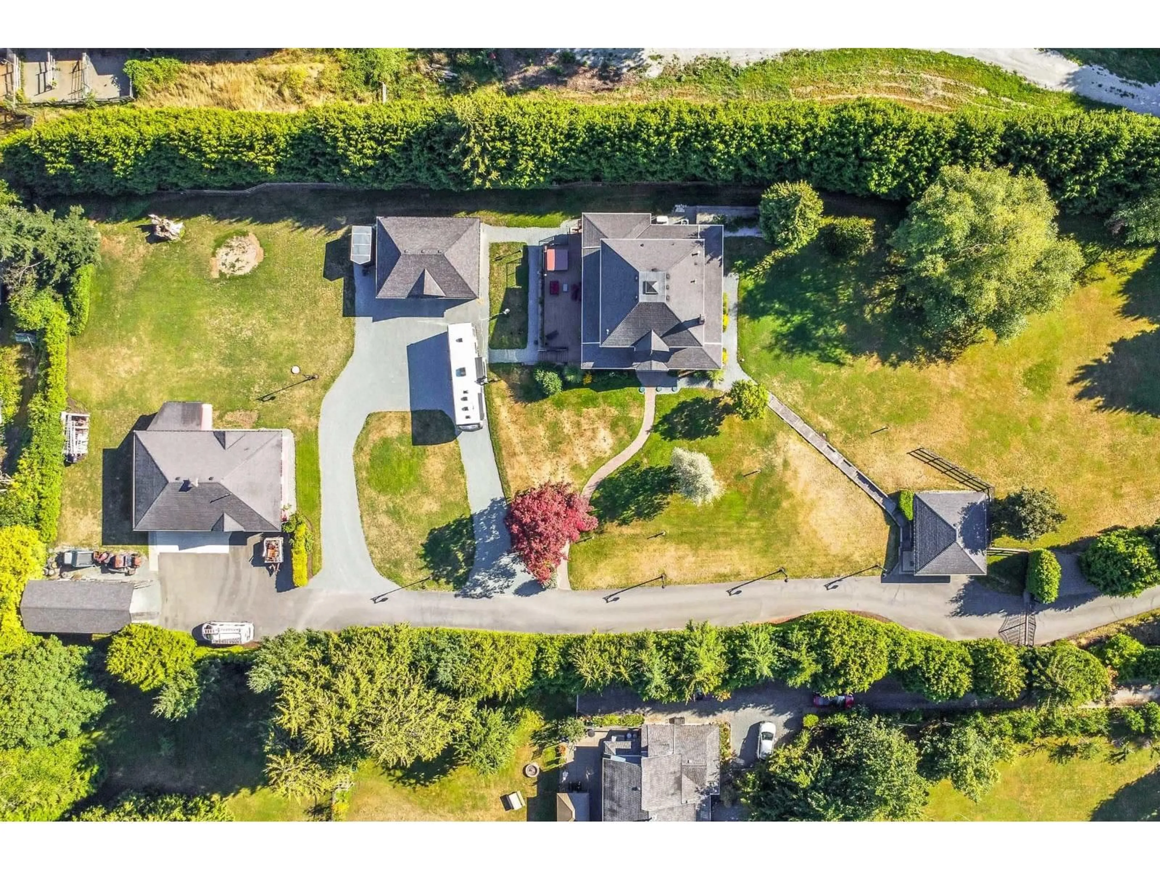 A pic from outside/outdoor area/front of a property/back of a property/a pic from drone, street for 1526 232, Langley British Columbia V2Z2W9