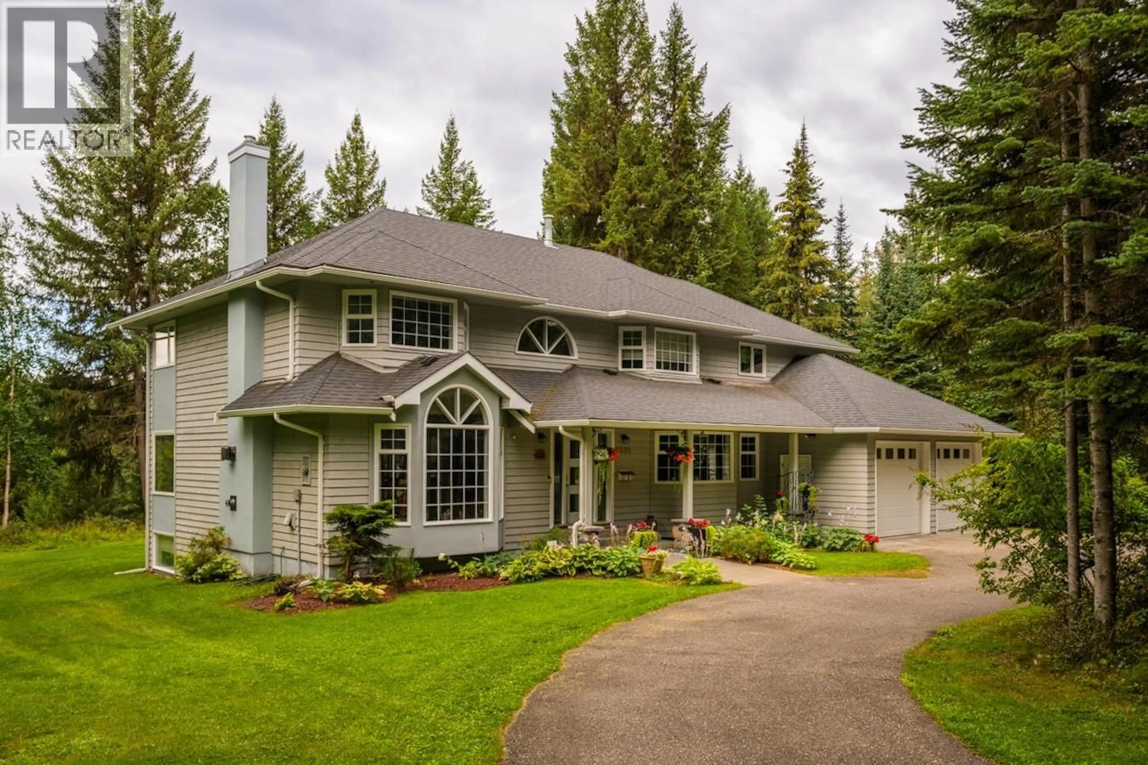 Home with vinyl exterior material, street for 8899 NORTH NECHAKO ROAD, Prince George British Columbia V2K4Z8