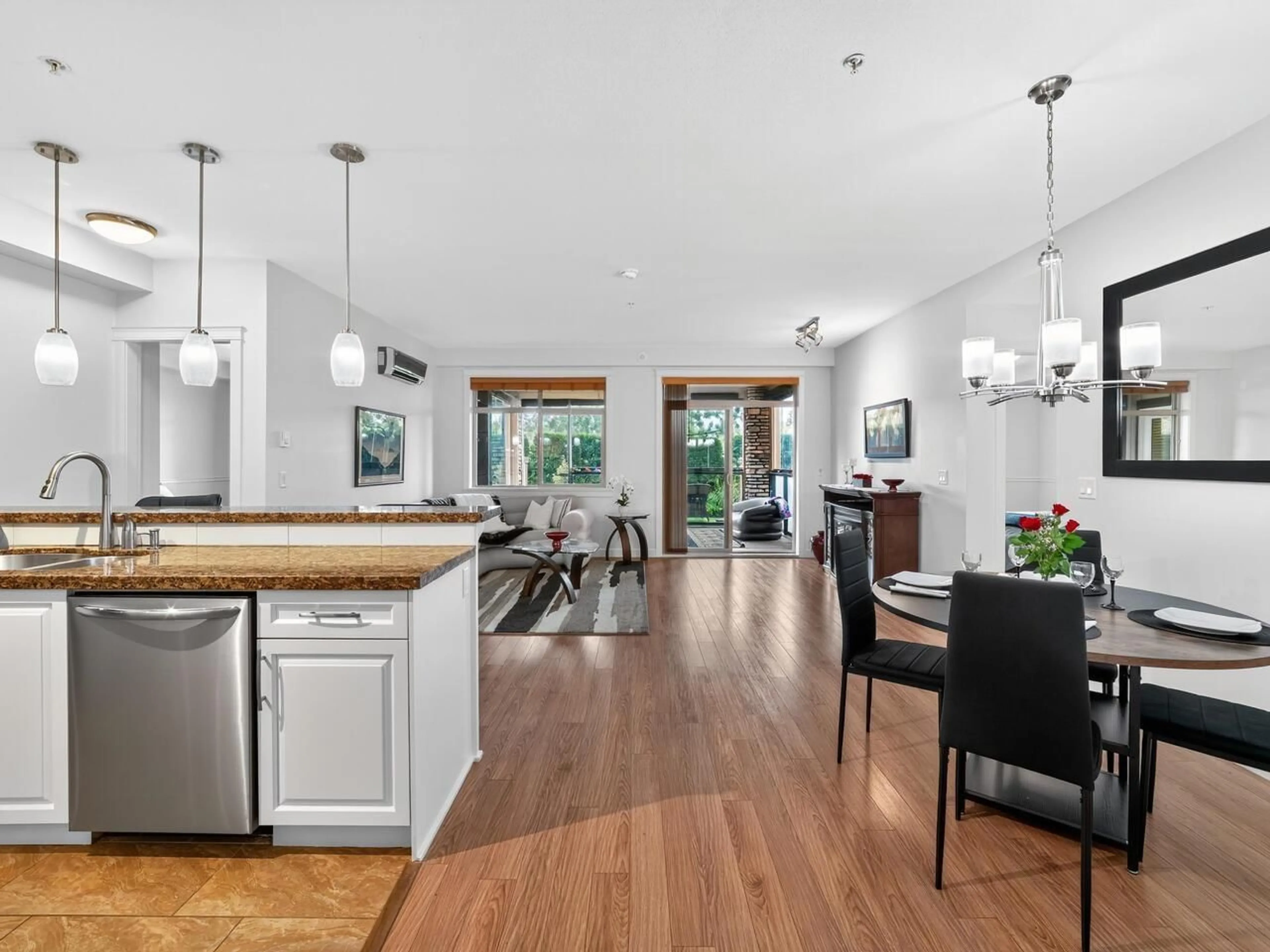 Open concept kitchen, wood/laminate floor for 111 - 8157 207, Langley British Columbia V2Y0V4
