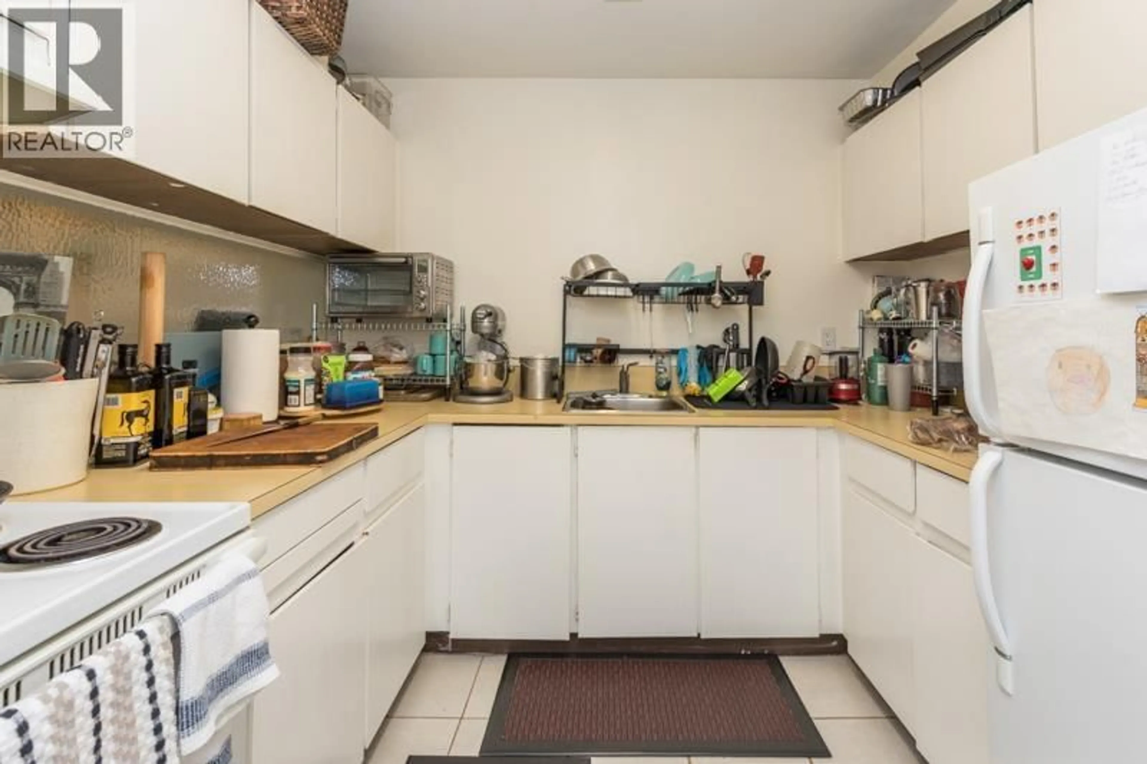 Standard kitchen, unknown for 201 - 8040 COLONIAL DRIVE, Richmond British Columbia V7C4V1