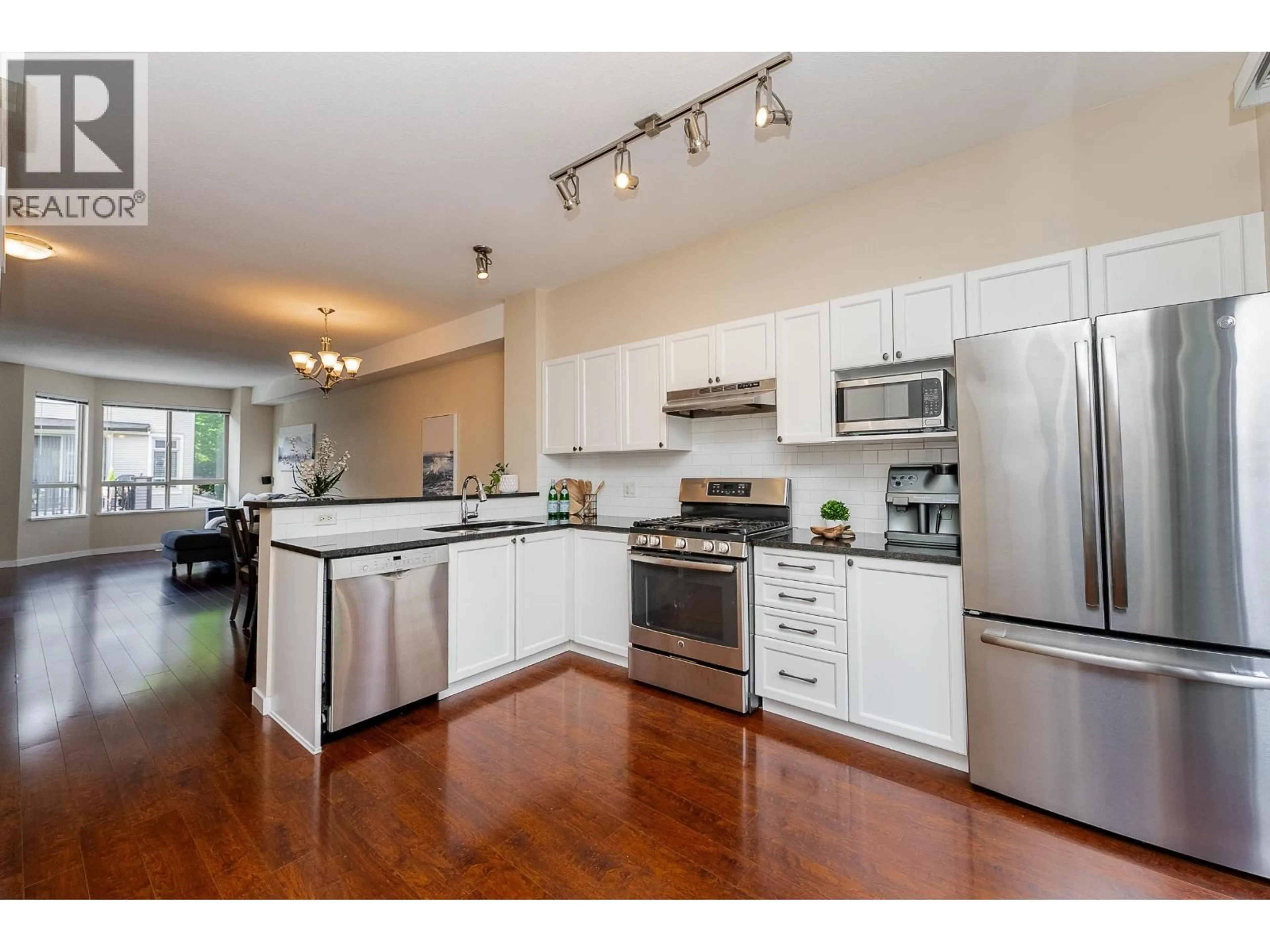 Open concept kitchen, wood/laminate floor for 17 - 100 KLAHANIE DRIVE, Port Moody British Columbia V3H5K3