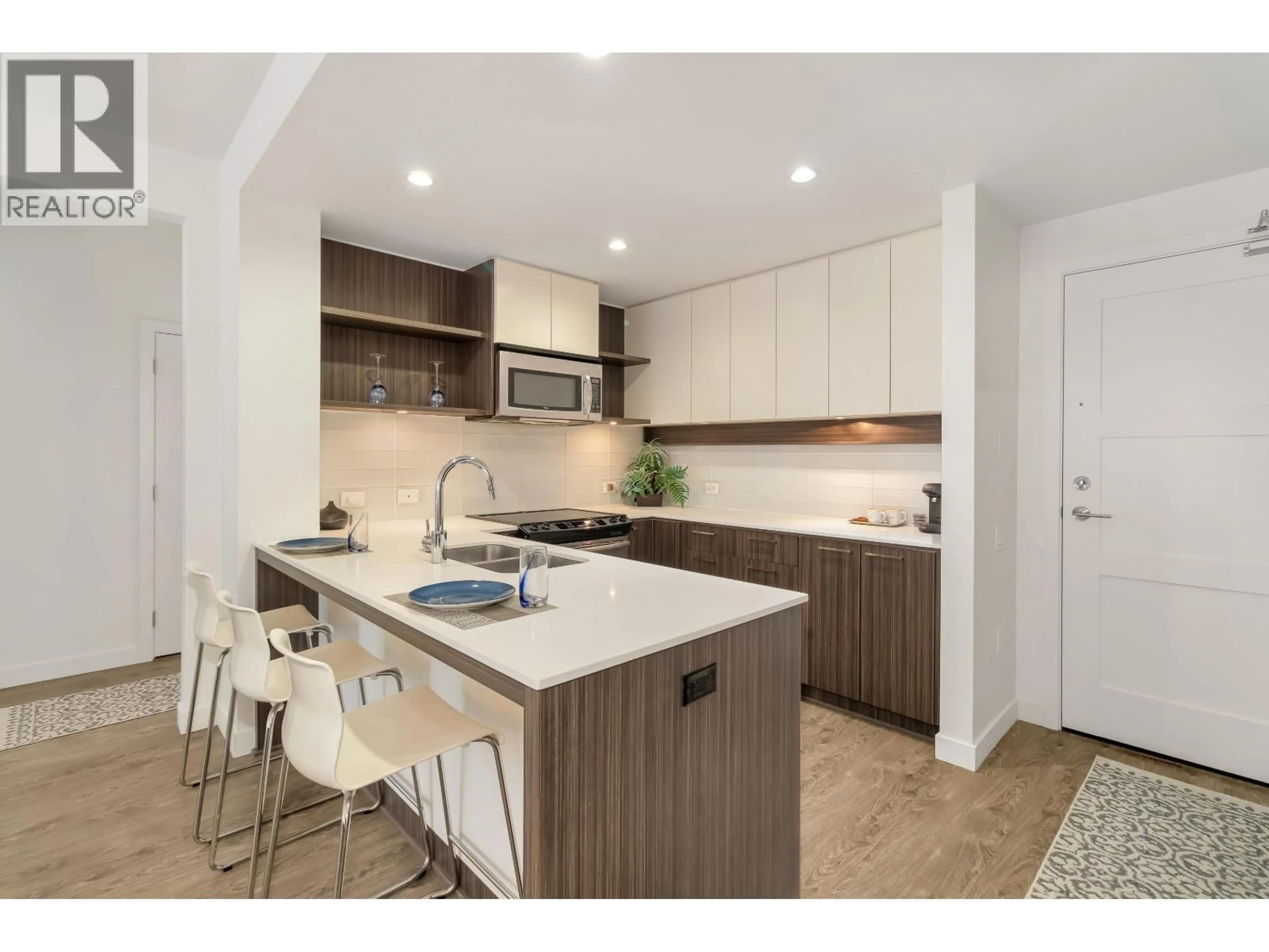Open concept kitchen, unknown for 110 - 608 COMO LAKE AVENUE, Coquitlam British Columbia V3J0B2