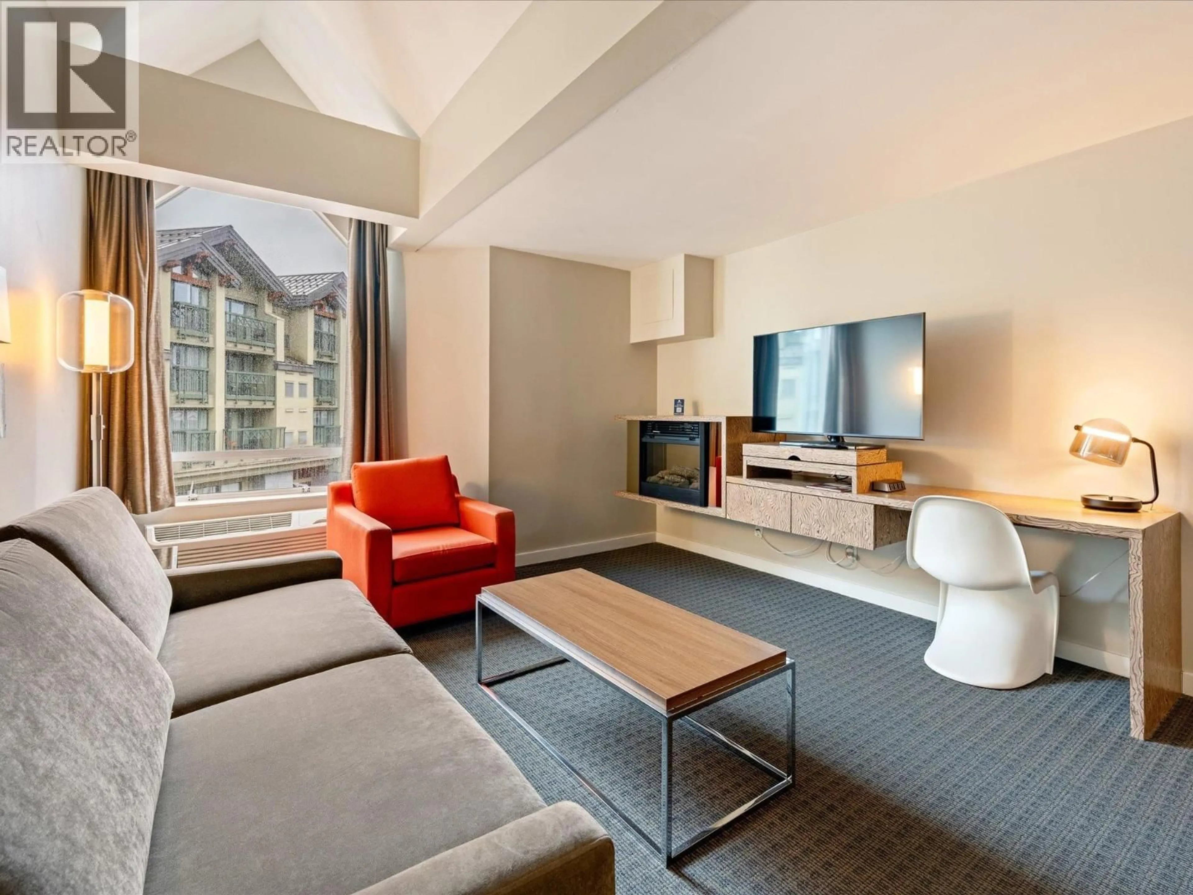 Living room with furniture, unknown for 307 - 4122 VILLAGE GREEN WAY, Whistler British Columbia V8E1G9