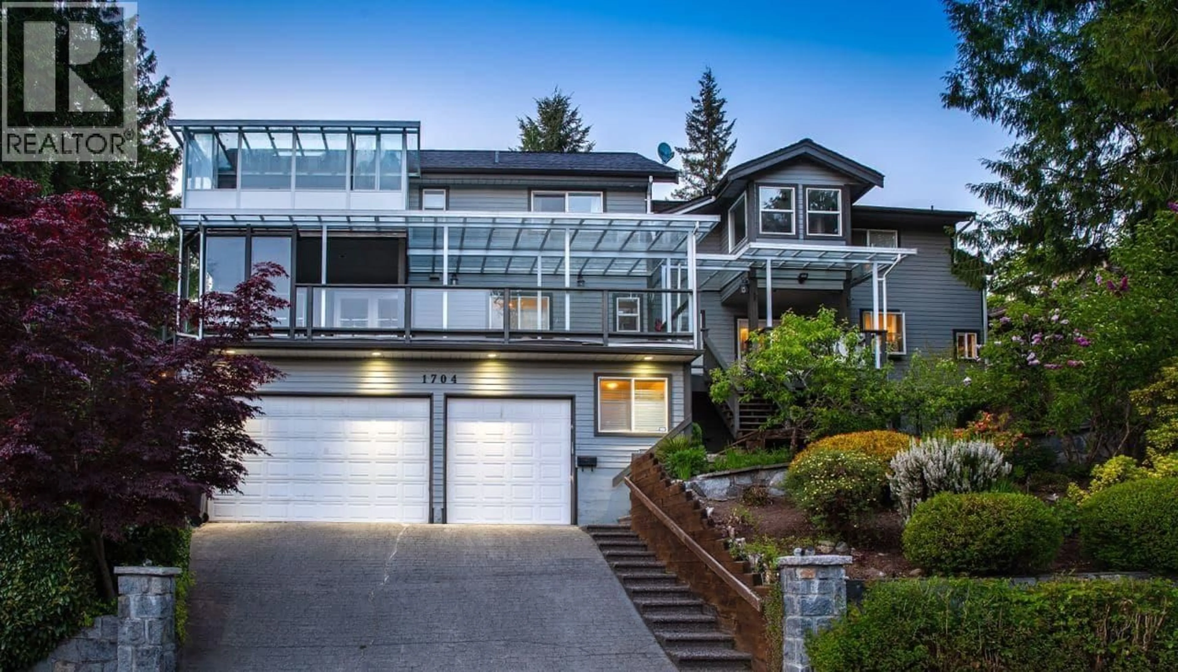 Home with vinyl exterior material, street for 1704 PIERARD ROAD, North Vancouver British Columbia V7J1Y2