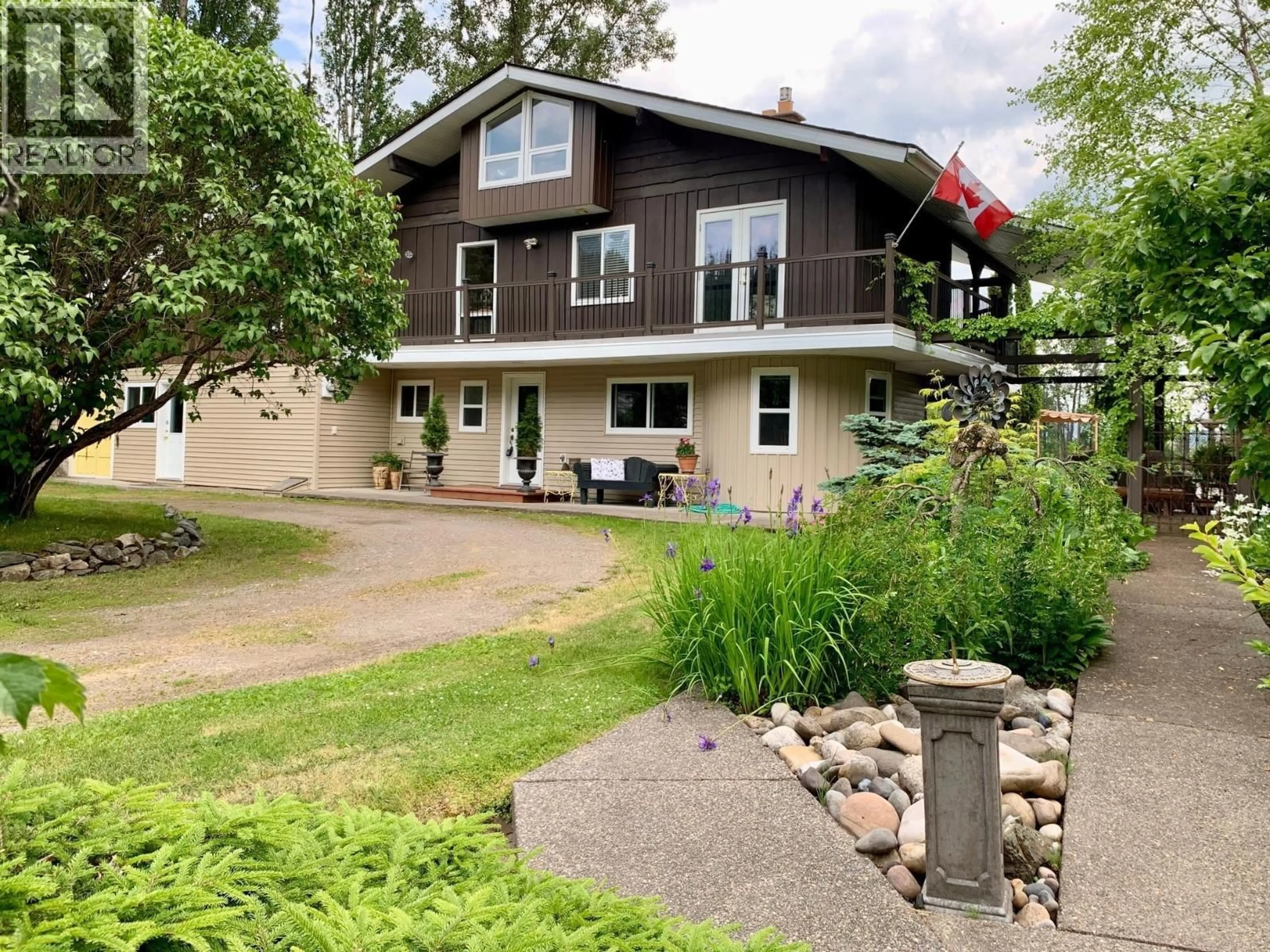A pic from outside/outdoor area/front of a property/back of a property/a pic from drone, street for 829 PG PULPMILL ROAD, Prince George British Columbia V2K5P4