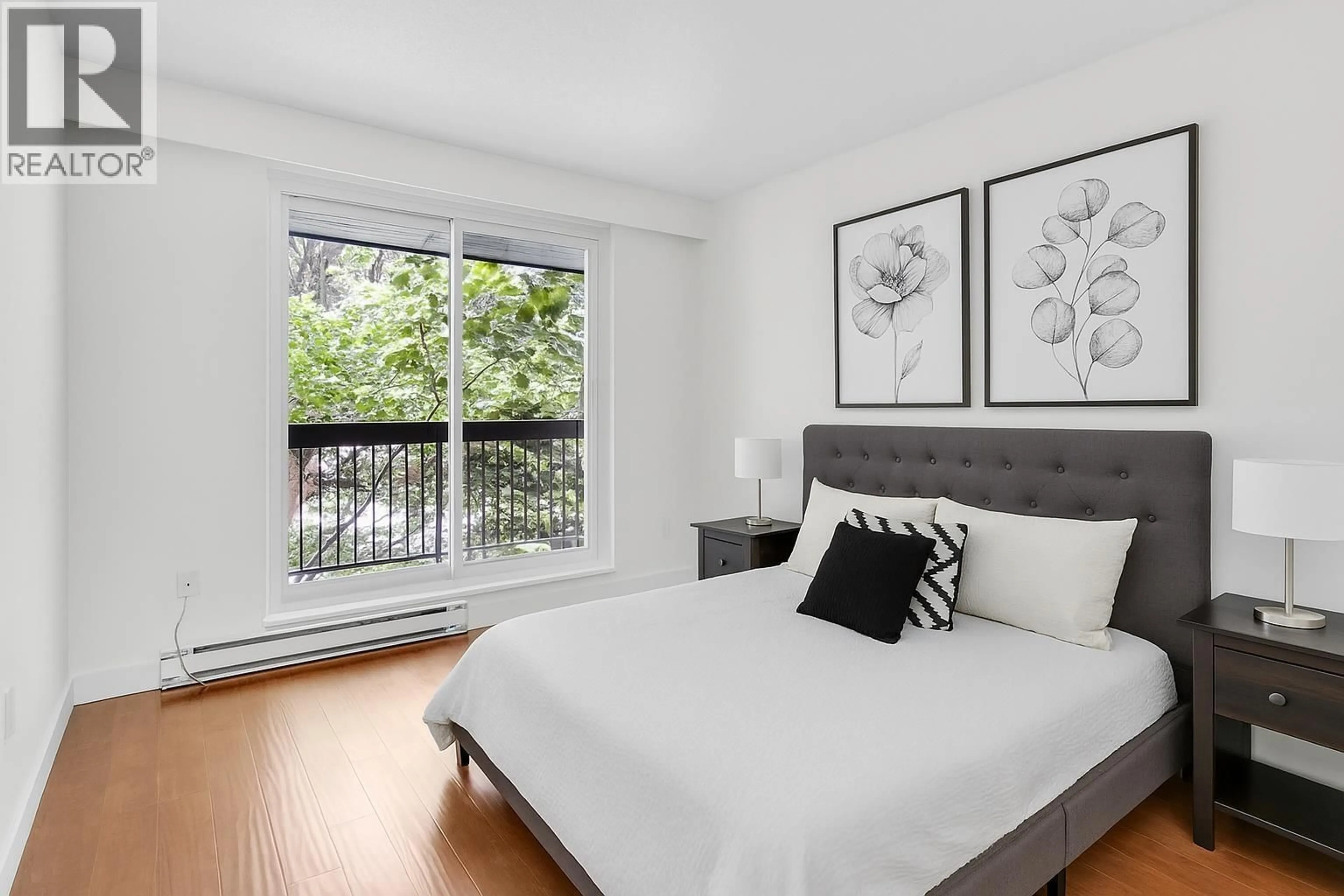 Bedroom with bed, wood/laminate floor for 307 - 2381 BURY AVENUE, Port Coquitlam British Columbia V3C1Z9