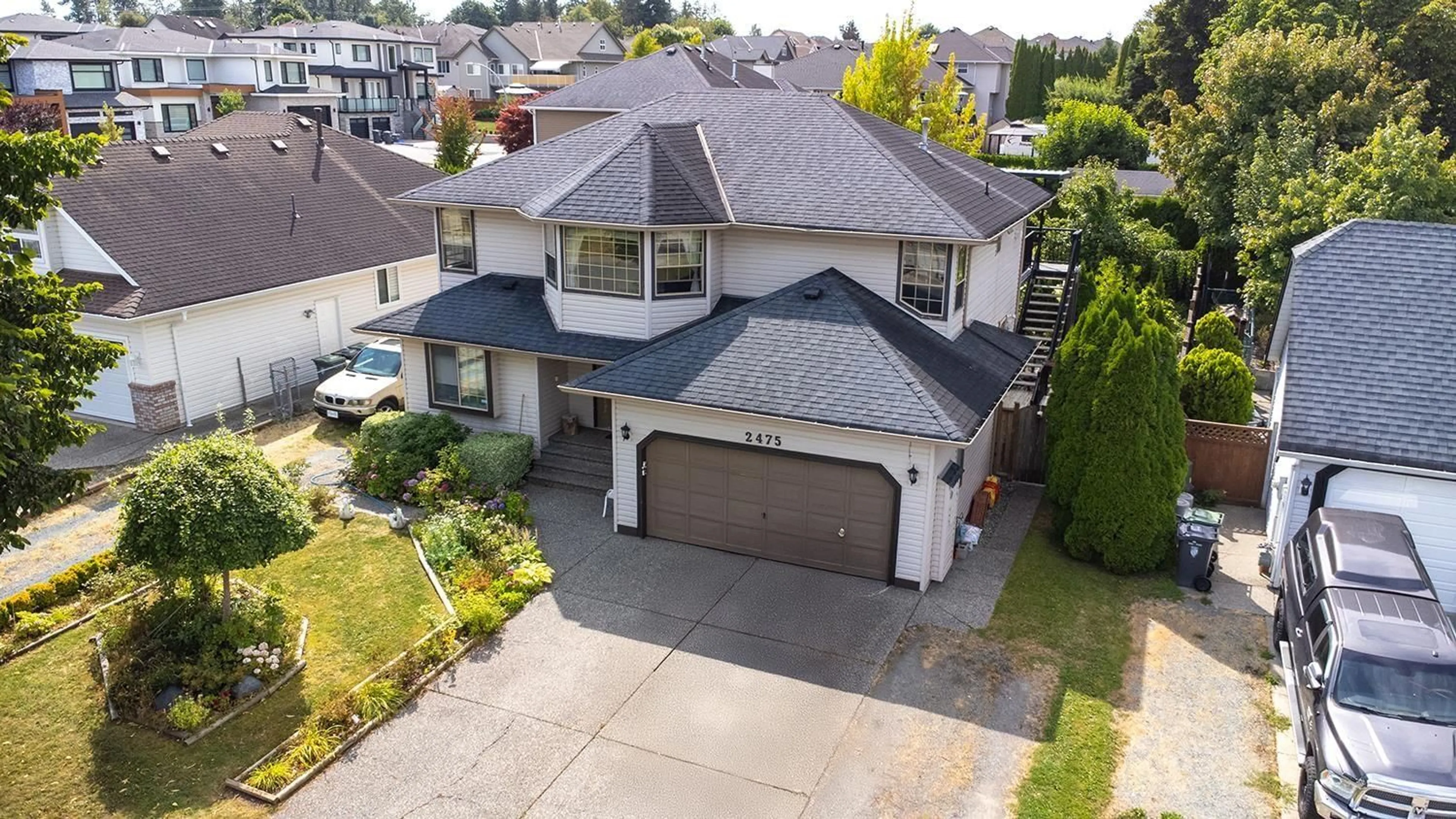 A pic from outside/outdoor area/front of a property/back of a property/a pic from drone, street for 2475 271A, Langley British Columbia V4W3N3