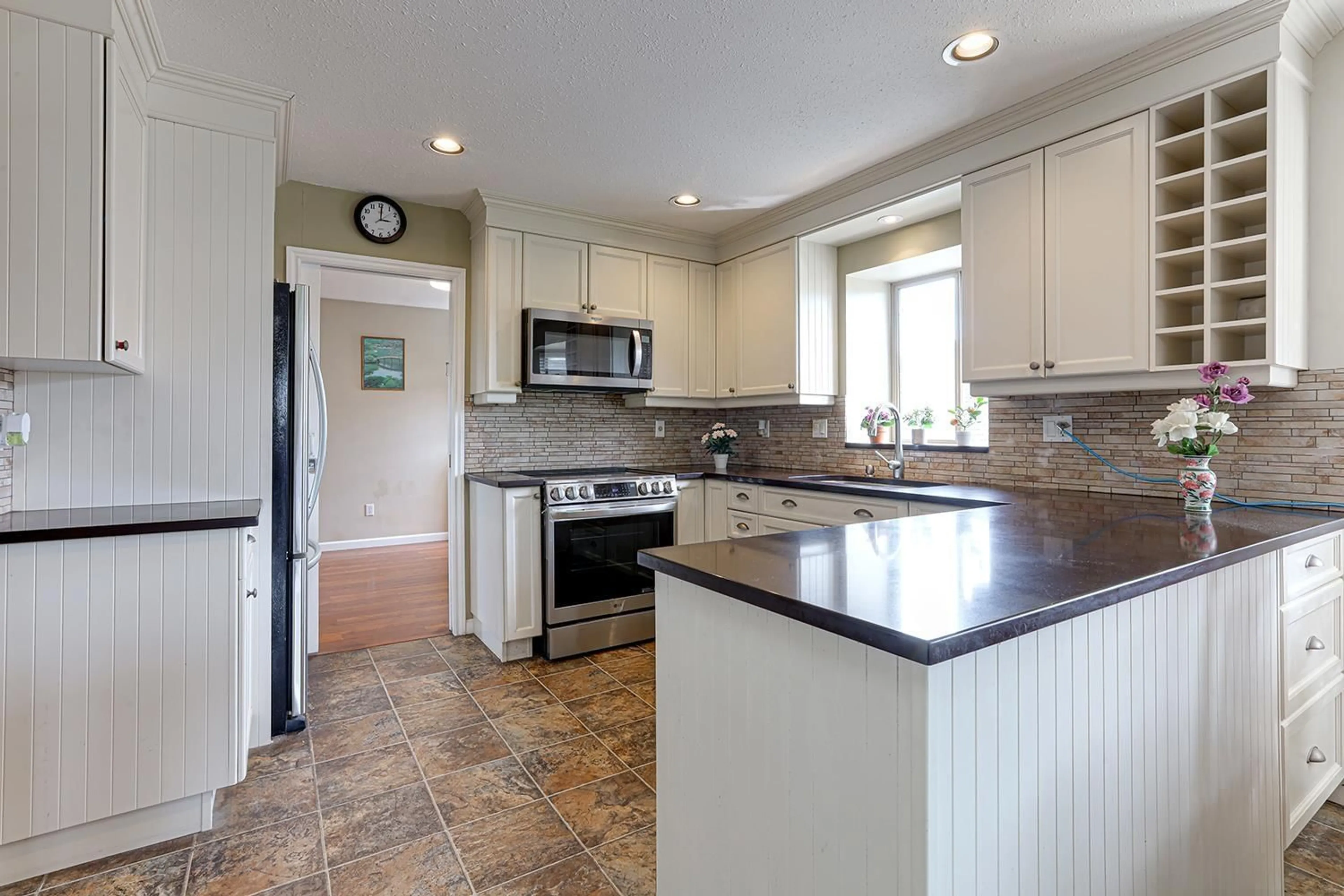 Open concept kitchen, ceramic/tile floor for 2475 271A, Langley British Columbia V4W3N3