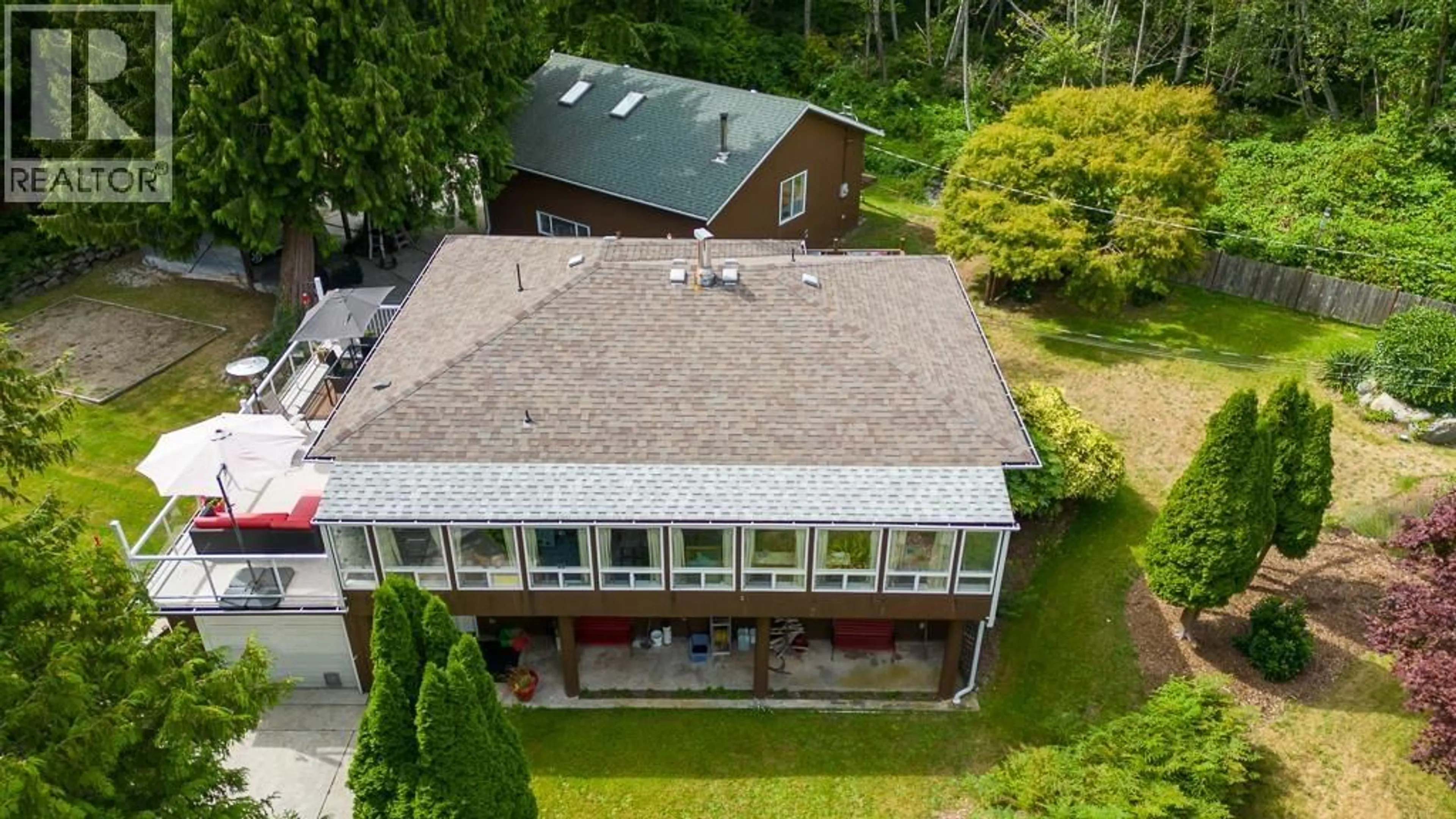 A pic from outside/outdoor area/front of a property/back of a property/a pic from drone, building for 7781 HART ROAD, Halfmoon Bay British Columbia V0N1Y1