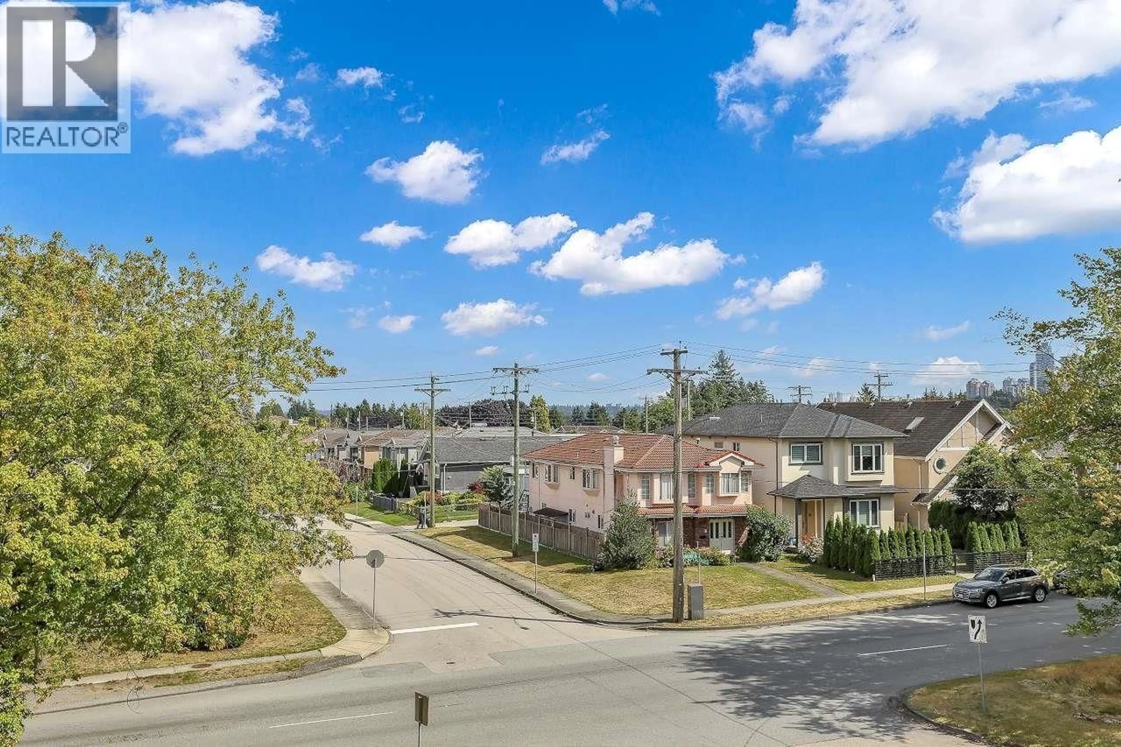A pic from outside/outdoor area/front of a property/back of a property/a pic from drone, street for 1 - 3695 26 AVE AVENUE, Vancouver British Columbia V5R2M7