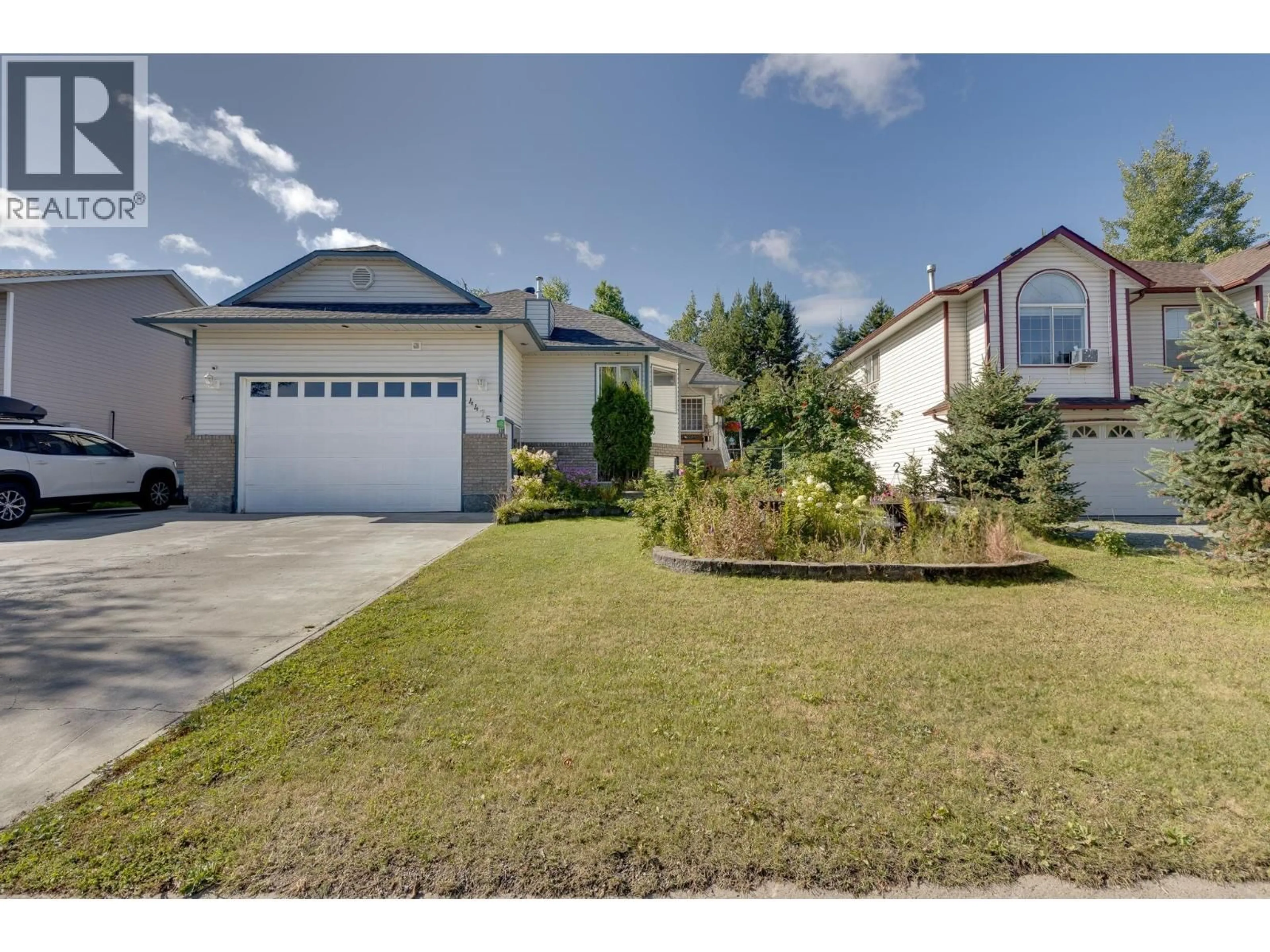 Home with vinyl exterior material, street for 4475 WHEELER ROAD, Prince George British Columbia V2N5H5