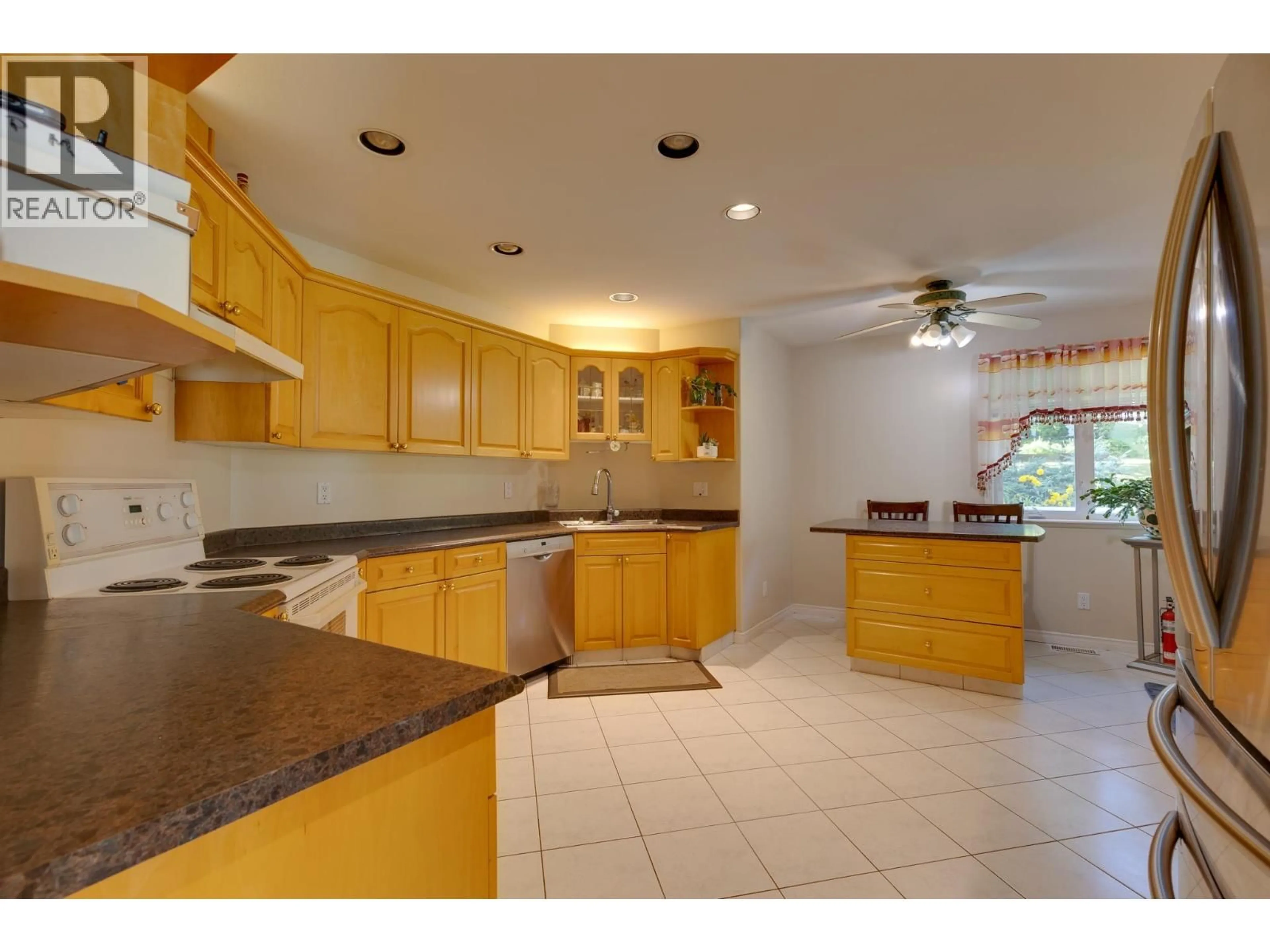 Open concept kitchen, ceramic/tile floor for 4475 WHEELER ROAD, Prince George British Columbia V2N5H5