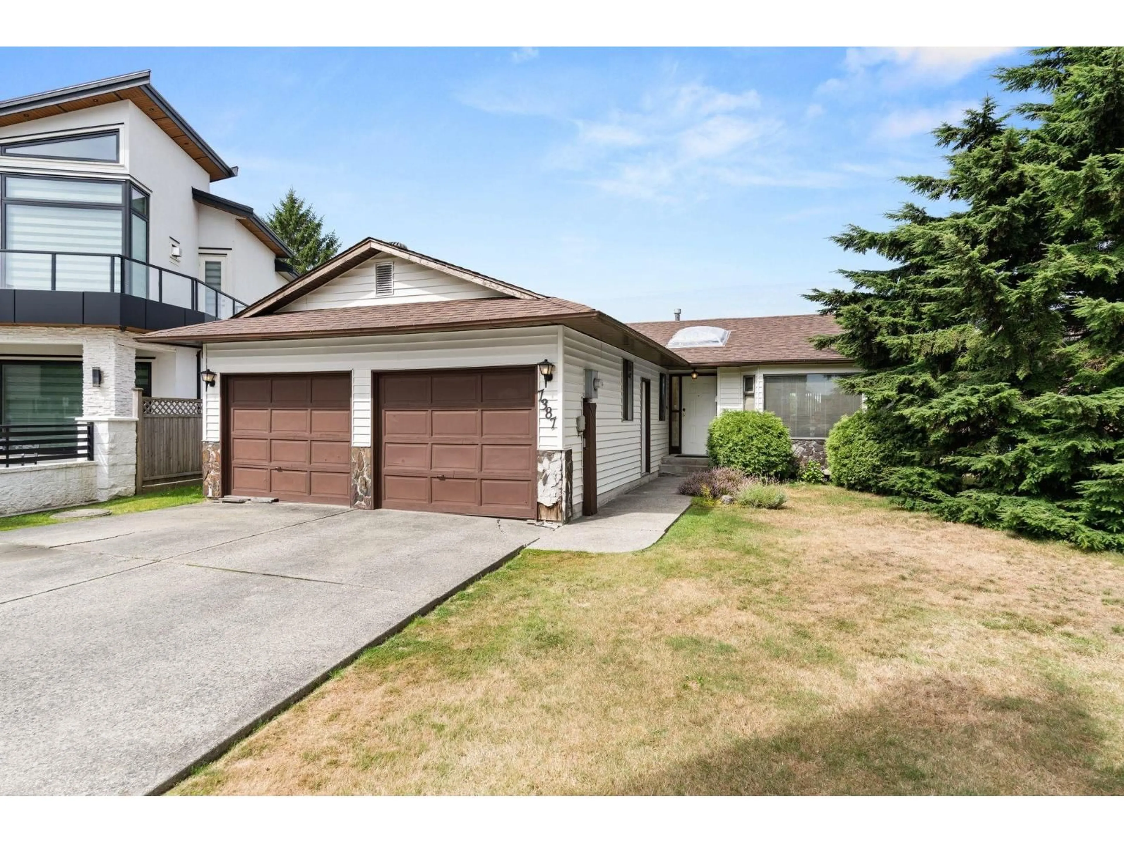 Home with vinyl exterior material, street for 7387 131A, Surrey British Columbia V3W8V5