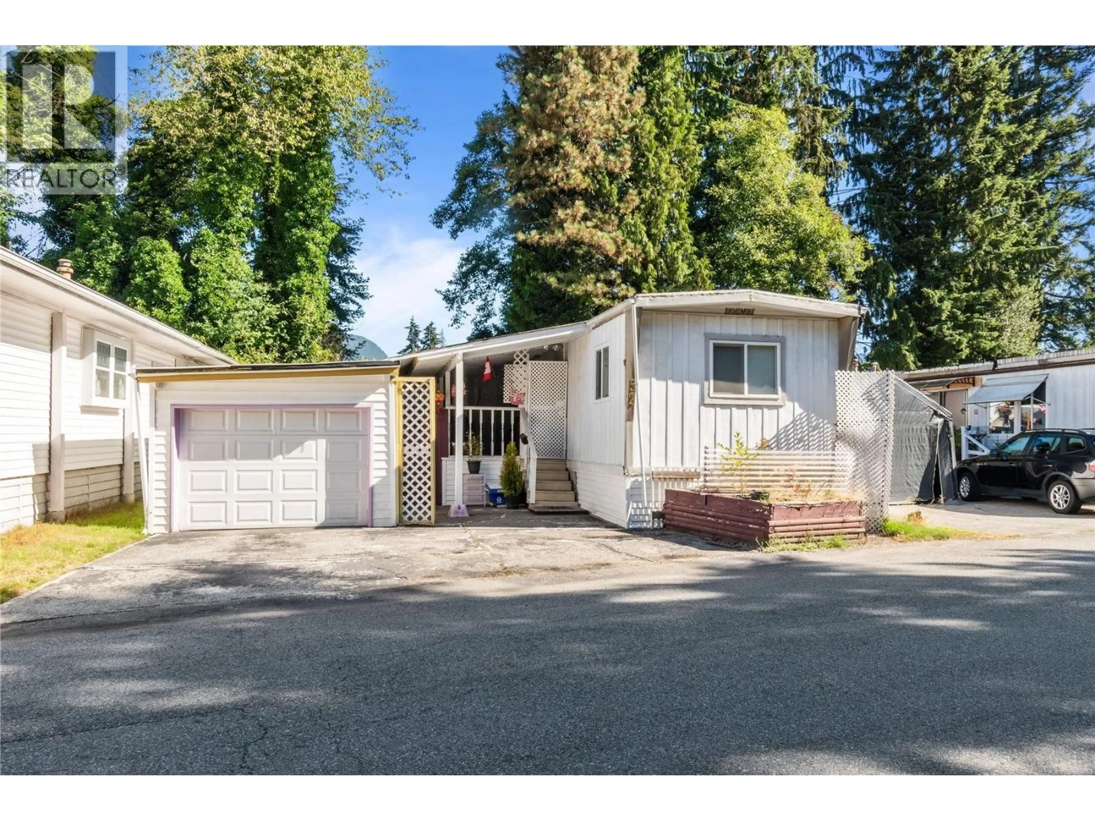 Home with vinyl exterior material, street for 52 4200 DEWDNEY TRUNK ROAD, Coquitlam British Columbia V3K2X8