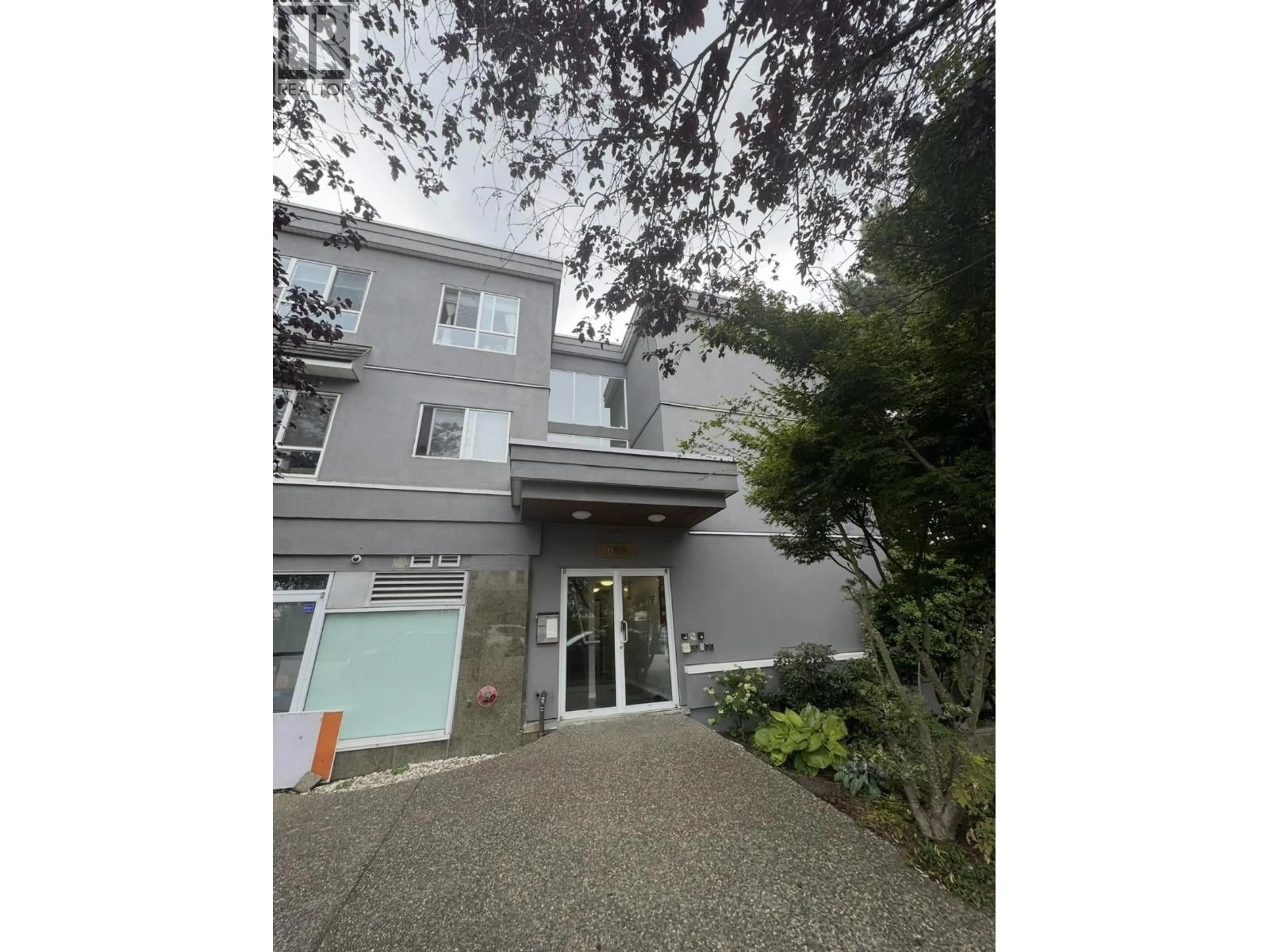 A pic from outside/outdoor area/front of a property/back of a property/a pic from drone, street for 302 - 688 56TH AVENUE, Vancouver British Columbia V5X1R7