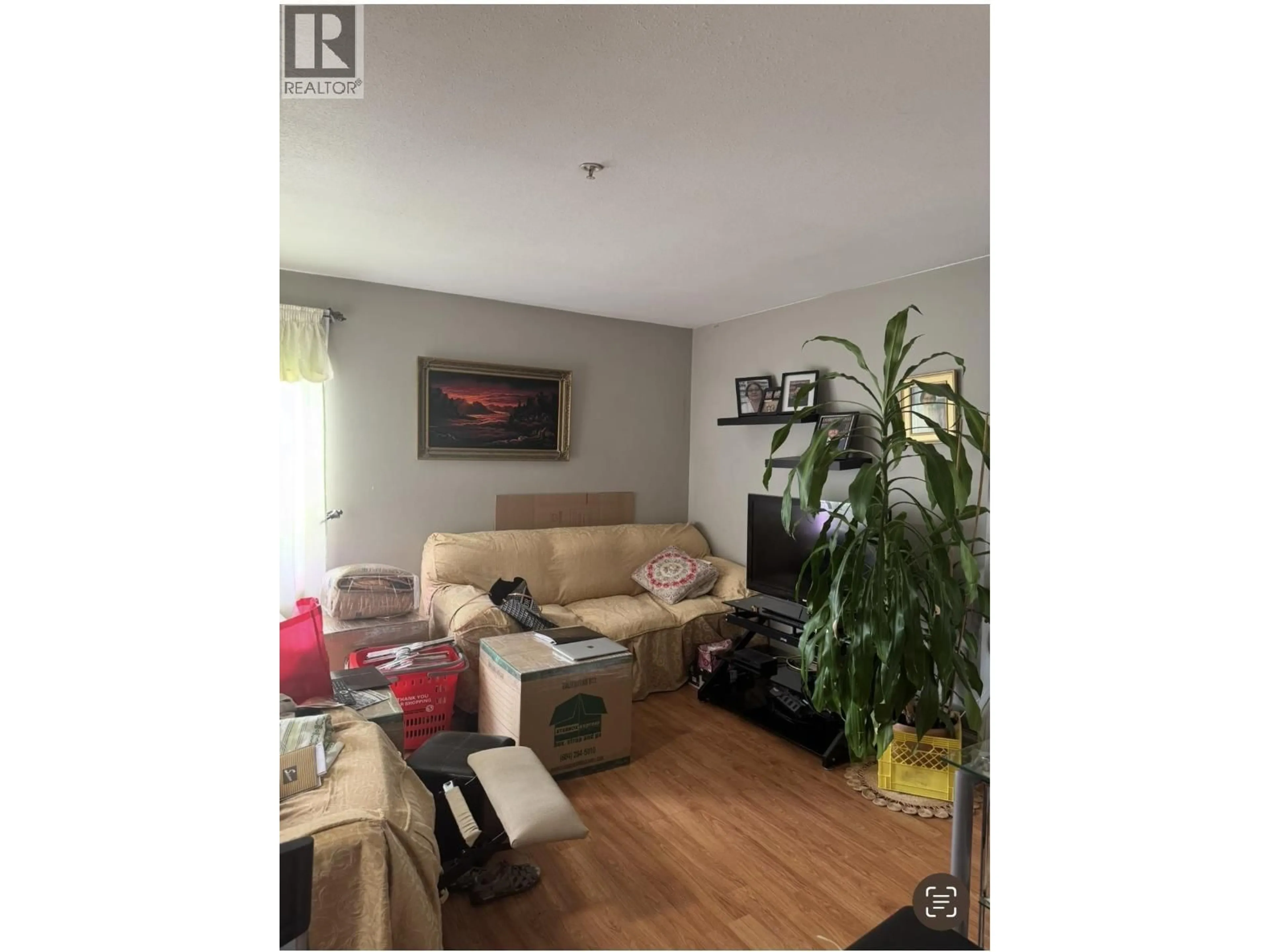 Living room with furniture, wood/laminate floor for 302 - 688 56TH AVENUE, Vancouver British Columbia V5X1R7