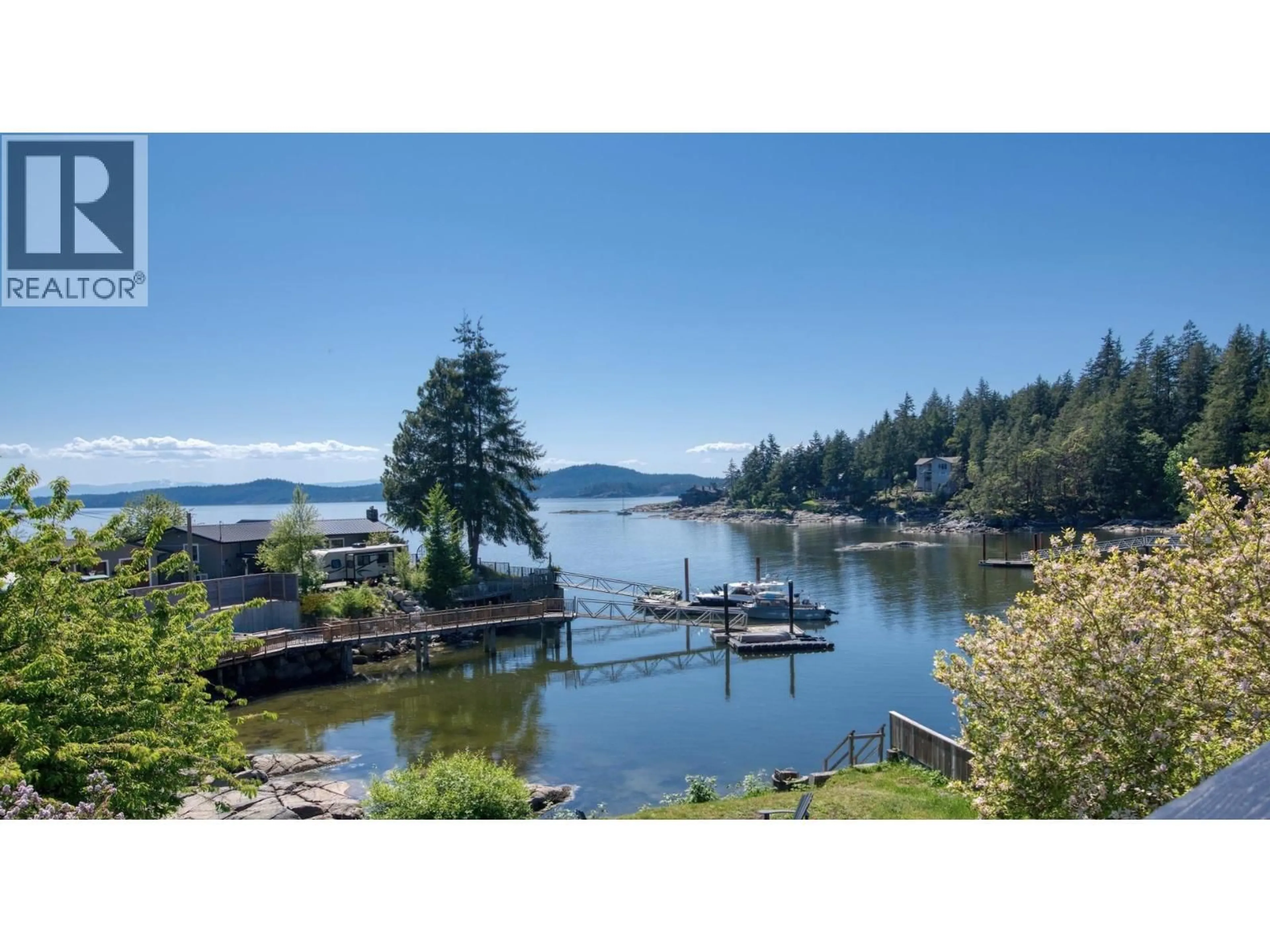 A pic from outside/outdoor area/front of a property/back of a property/a pic from drone, water/lake/river/ocean view for 5639 O'BRIAN ROAD, Halfmoon Bay British Columbia V7Z1E9