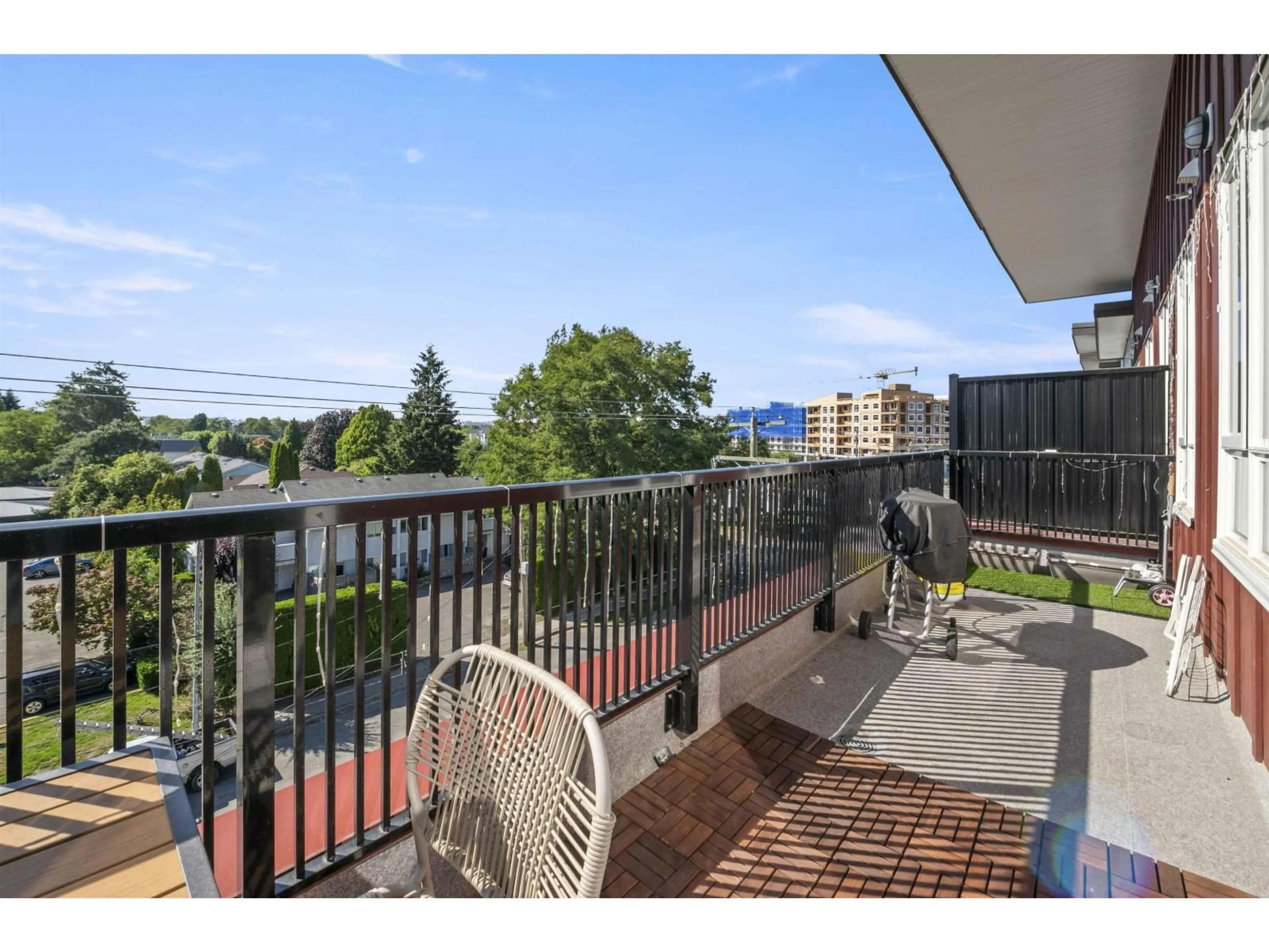 Balcony in the apartment, city buildings view from balcony for 403 - 5420 208, Langley British Columbia V3A0P8