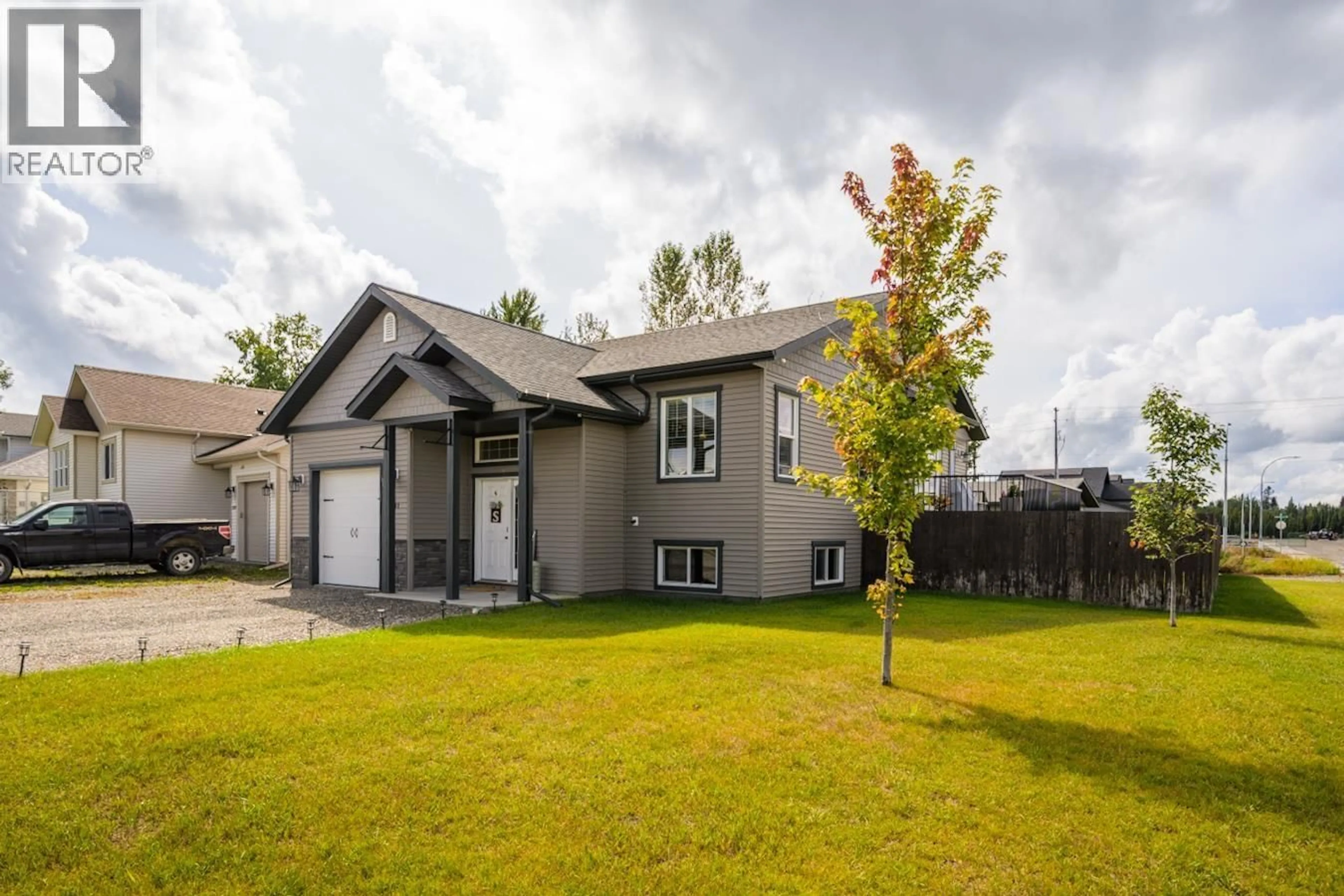 Home with vinyl exterior material, street for 5591 WOODVALLEY DRIVE, Prince George British Columbia V2K5A6