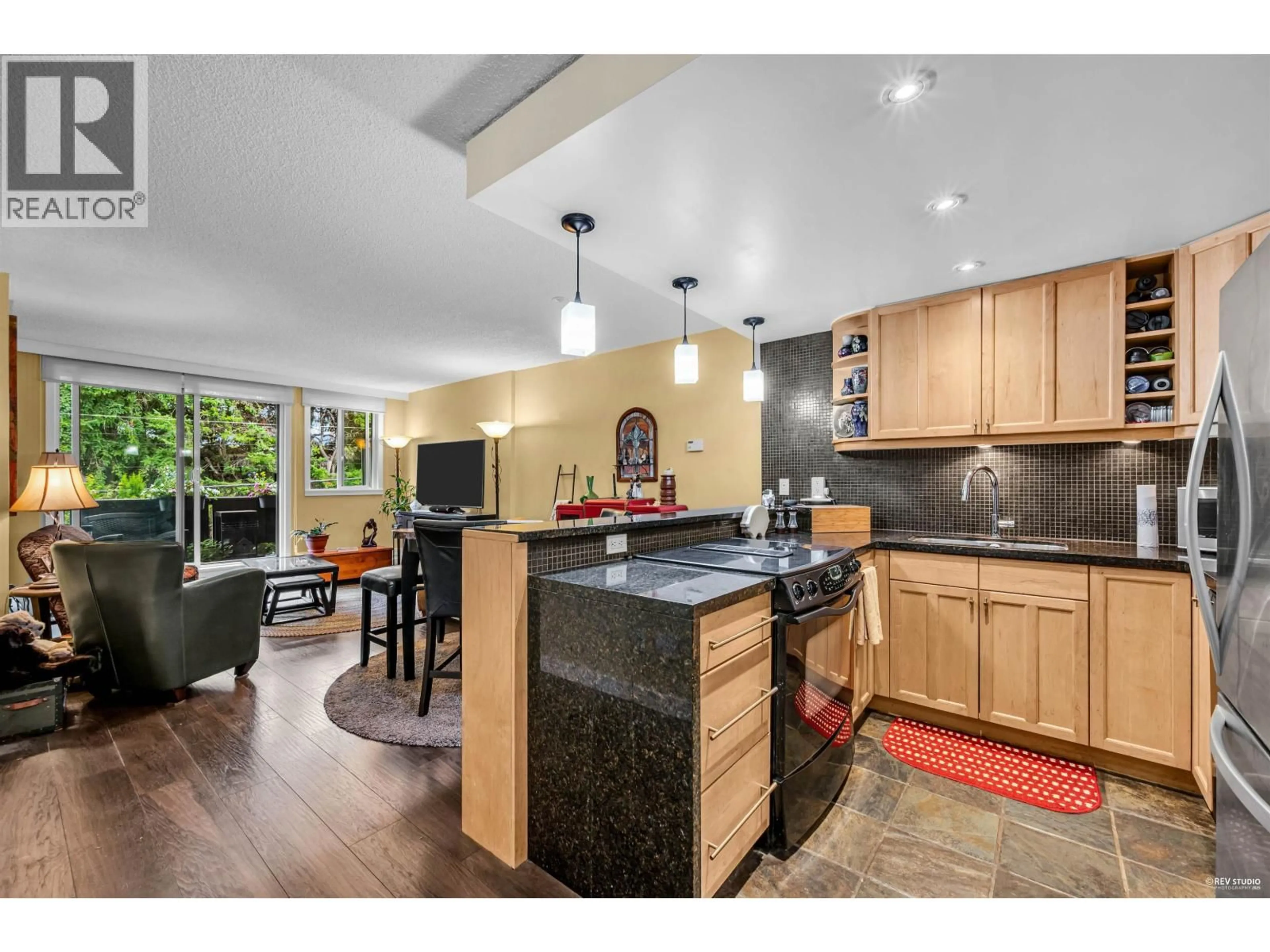 Open concept kitchen, ceramic/tile floor for 203 - 1867 3RD AVENUE, Vancouver British Columbia V6J1K9