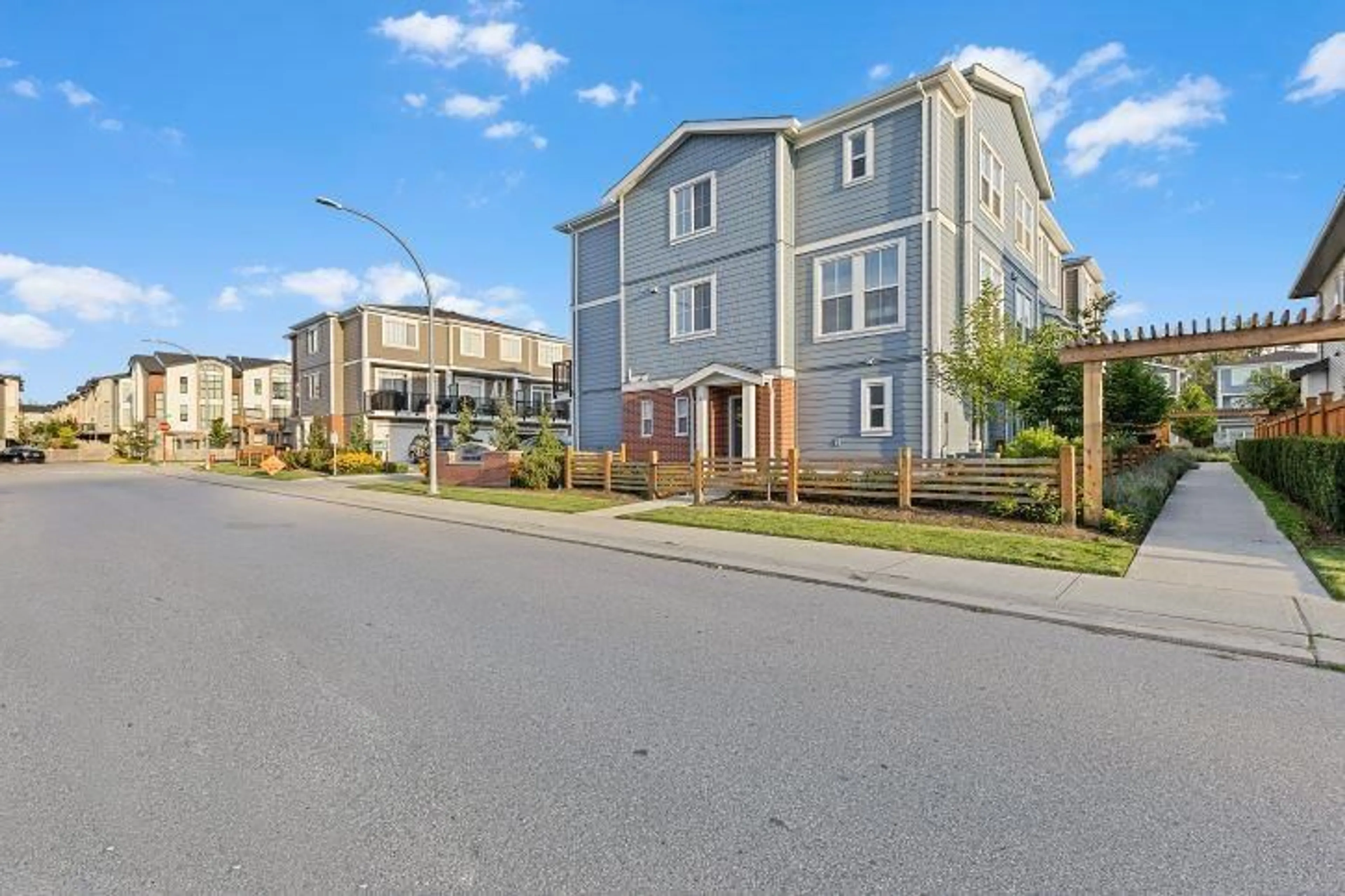 A pic from outside/outdoor area/front of a property/back of a property/a pic from drone, street for 1 - 20680 76B, Langley British Columbia V2Y4L2