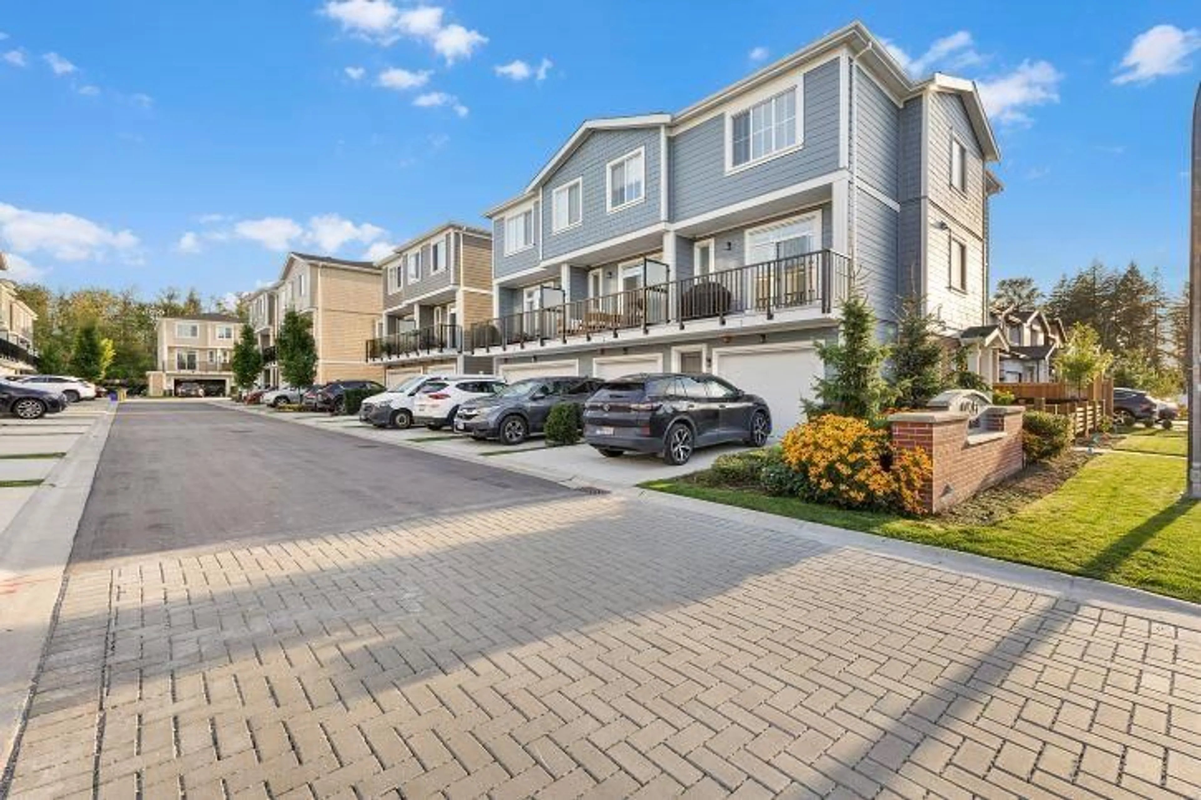 A pic from outside/outdoor area/front of a property/back of a property/a pic from drone, street for 1 - 20680 76B, Langley British Columbia V2Y4L2