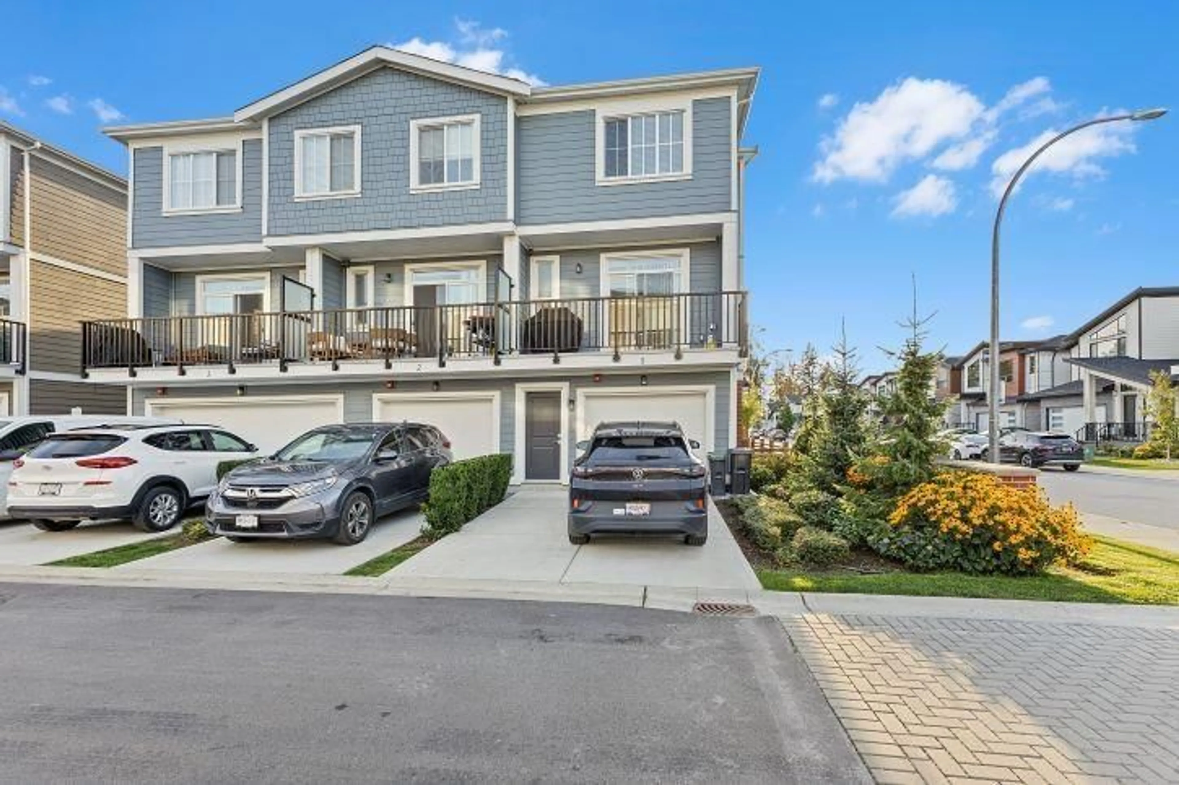 A pic from outside/outdoor area/front of a property/back of a property/a pic from drone, street for 1 - 20680 76B, Langley British Columbia V2Y4L2